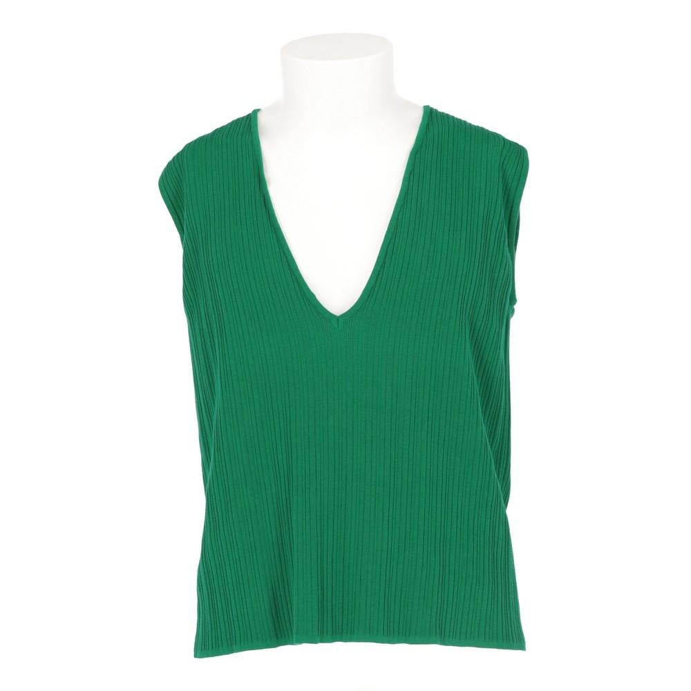 Romeo Gigli green cotton vest. V-neck and tight rib knit.

Years: 2000s

Made in Italy
Size: 52 IT

Flat measurements
Height: 62 cm
Bust: 49 cm