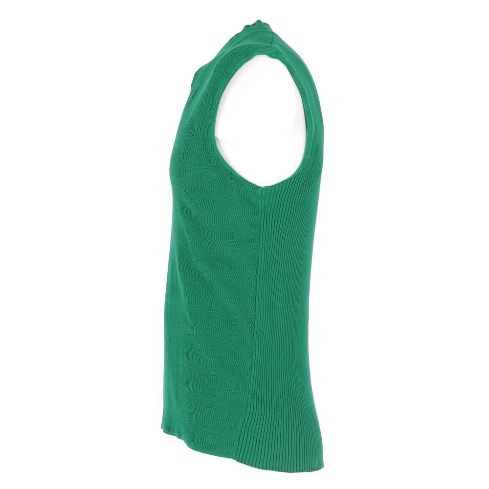 Romeo Gigli green cotton vest. V-neck, straight and wavy rib knit. 

Years: 2000s

Made in Italy

Size: 50 IT

Flat measurements :

Height: 63 cm
Bust: 46 cm