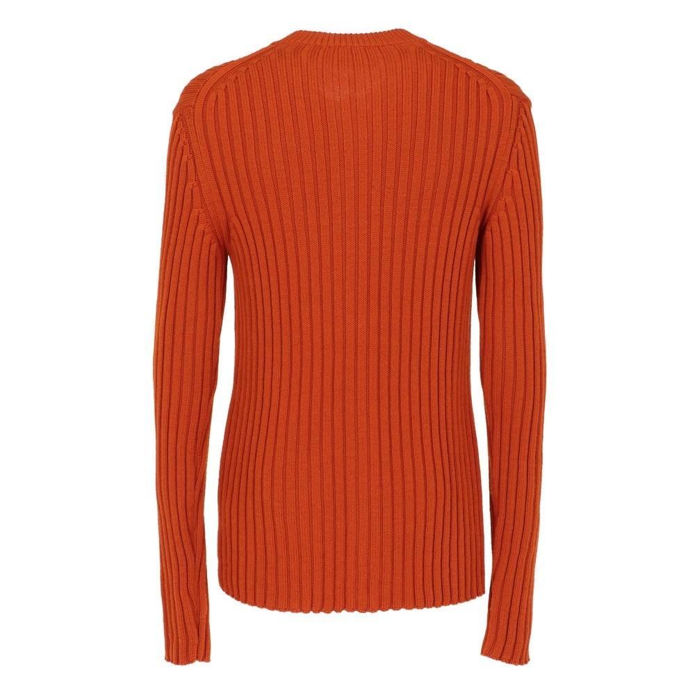 Romeo Gigli orange virgin wool cardigan. Crewneck, wide rib knit and front zip closure.

Size: 54 IT

Flat measurements
Height: 77 cm
Bust: 49 cm
Shoulders: 48 cm
Sleeves: 80 cm

Product code: X0834

Composition: 100% Virgin wool

Made in: