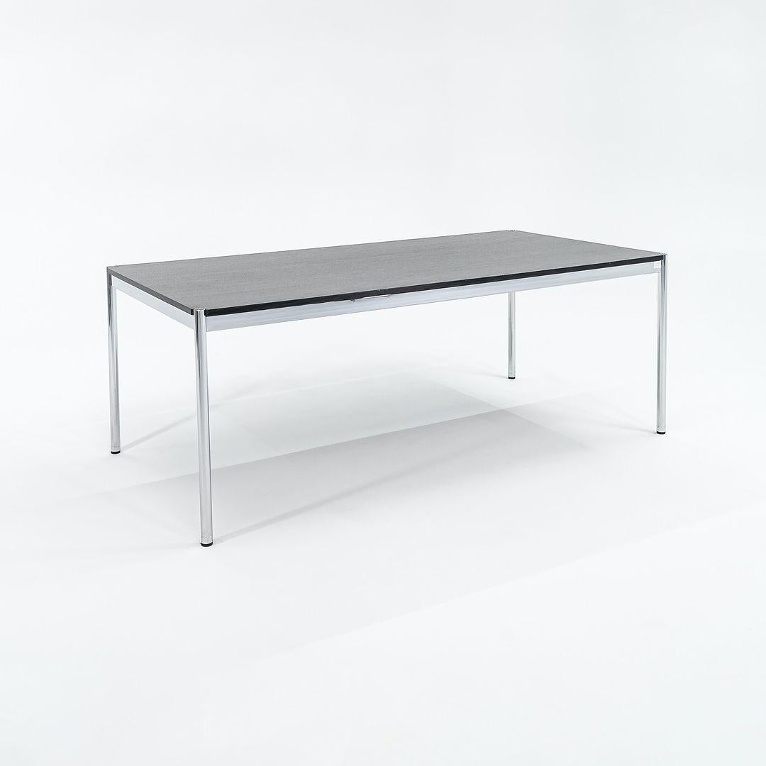 Listed for sale is a single USM Haller T79 Table / Desk, (eight are available, though they are priced individually), with polished chrome framing and an ebonized wood top. We guarantee this to be an authentic USM Haller piece made in Switzerland. As