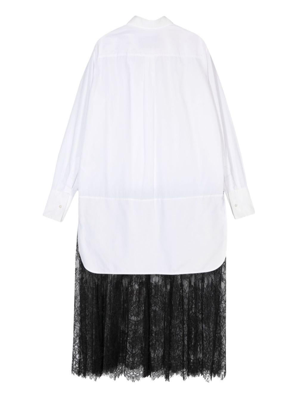 Valentino Dress by Pierpaolo Piccioli black & white lace shirt dress featuring a top cotton white shirt with textured cotton at collar and cuffs, front button fastening, long sleeves
buttoned cuffs, a black transparent lace skirt part.
Composition:
