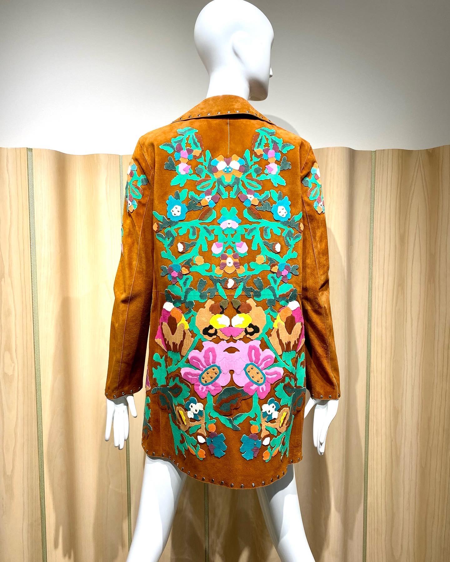2000s Valentino Suede Jacket/ Coat  western style embroidered with green, fuschia, White, yellow and brown suede floral cut out. 
Jacket/ coat marked size 6
Measurement:  Shoulder : 16” / B 38” / W 38” / H 42” / Sleeve: 23” / Coat Length: 30”