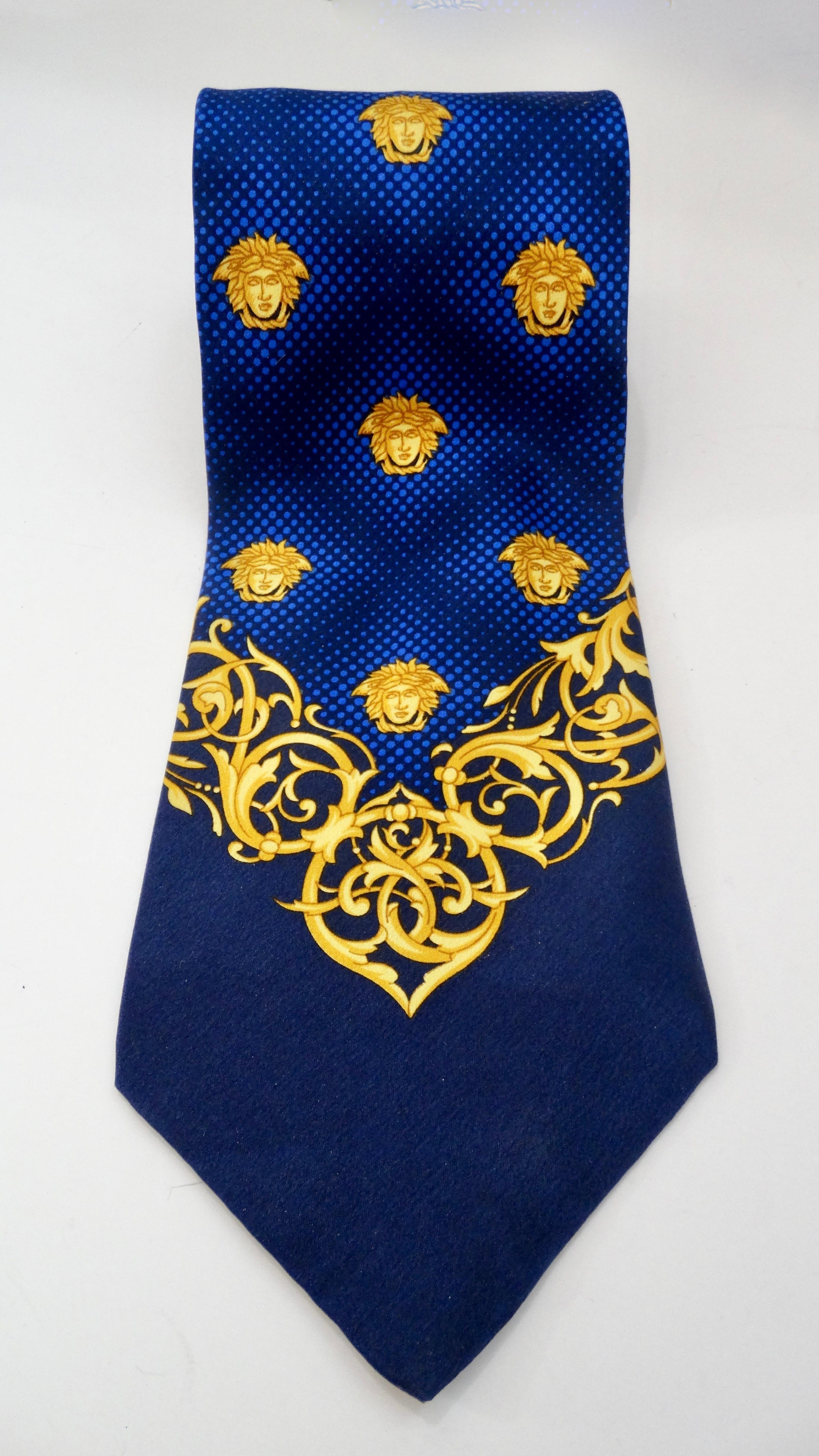 Elevate your look with this Gianni Versace tie! Circa 2000s, this Silk tie features two contrasting polka dot prints, a small Baroque trim, and the signature Versace Medusa head. The perfect tie to add to your wardrobe! Made in Spain and come with