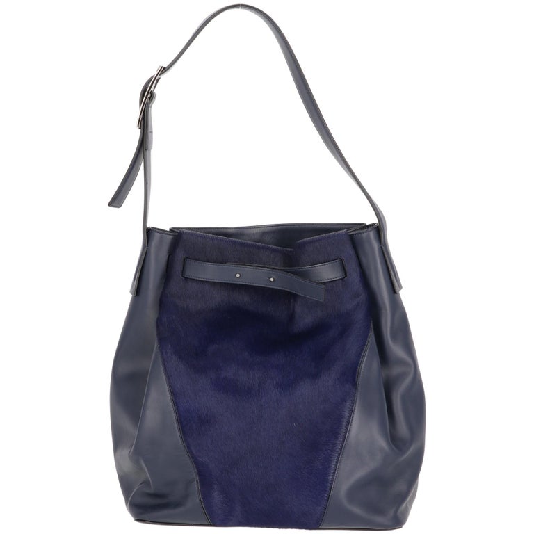 2000s Vince blue leather bag featuring a tone-on-tone calf hair insert ...