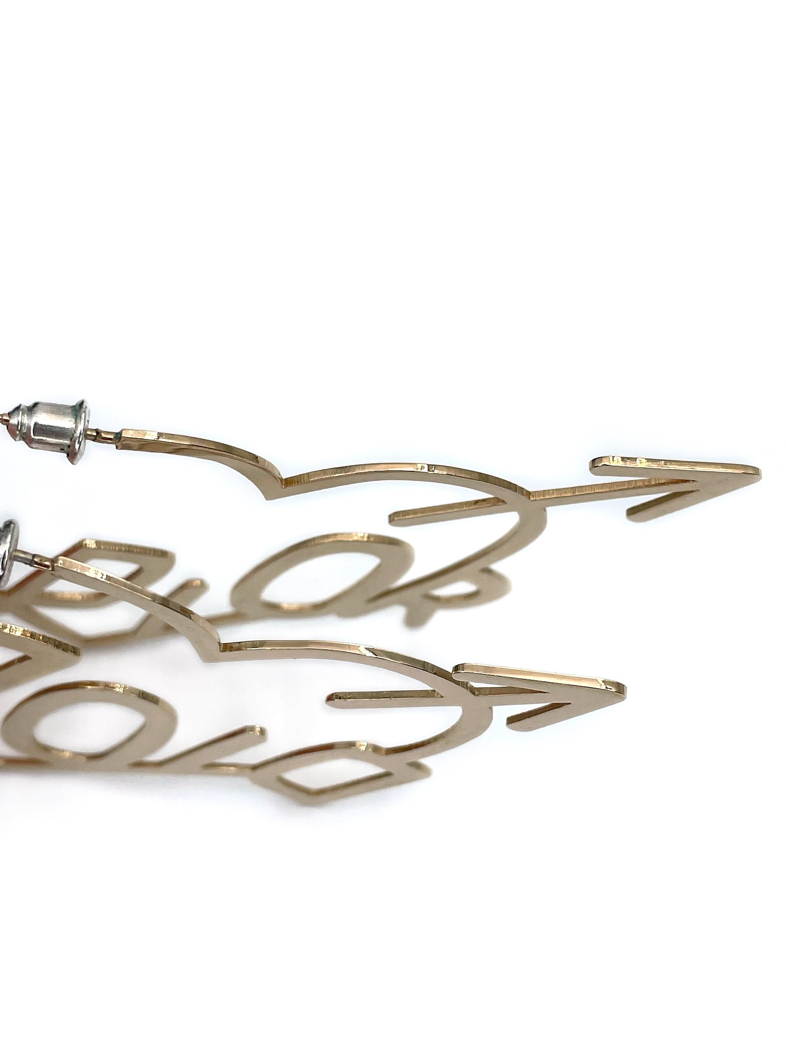 Modern 2000s Vintage Christian Dior Gold Tone Heart Arrow Massive Hoop Earrings