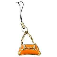 2000s Vintage Gucci Orange Metal Lacquered Horsebit Miniature Bag Charm Keyring