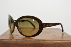 Occhiali da sole Versace vintage degli anni 2000, neri e verde lime, oversize, con montatura ovale grande