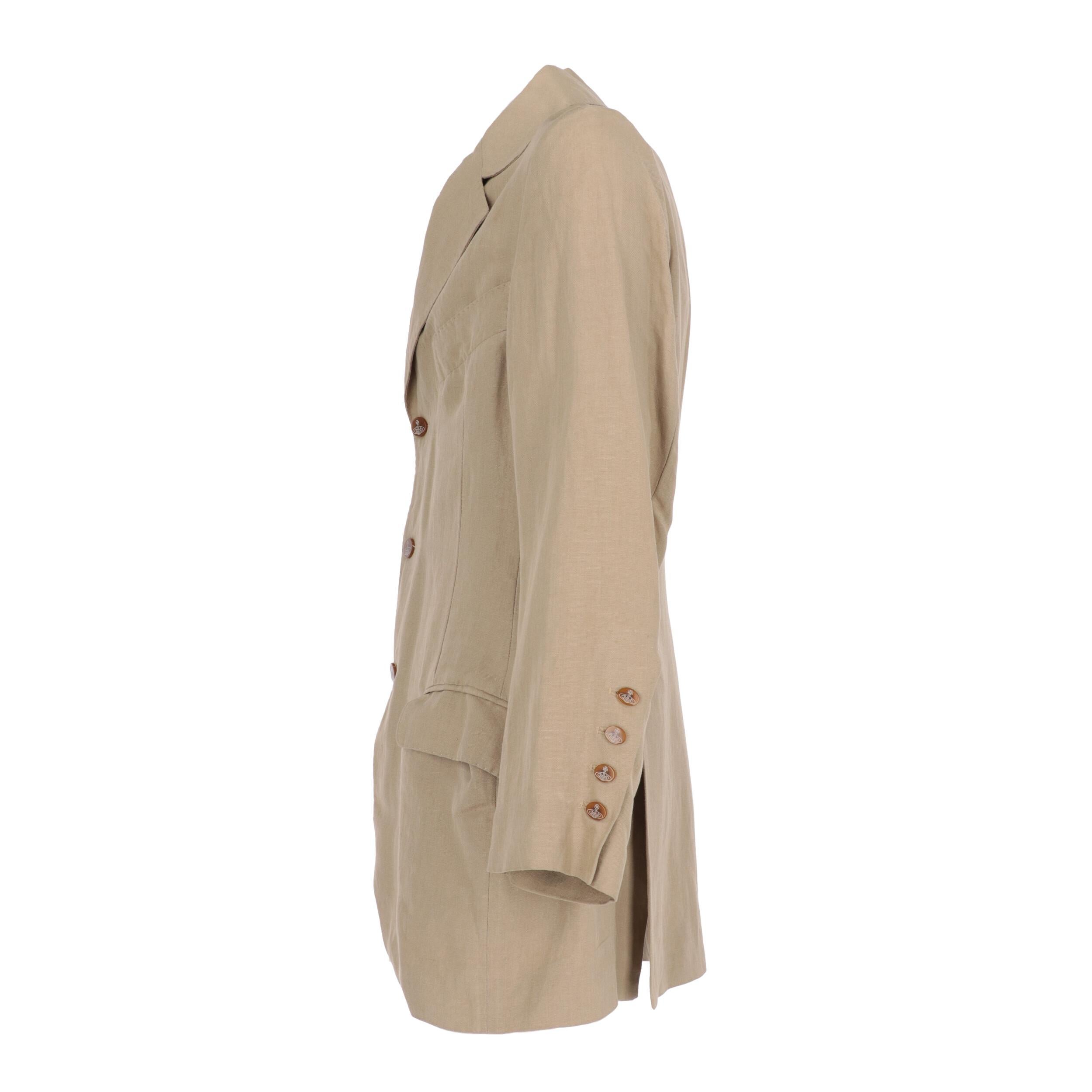 Vivienne Westwood beige linen blend fabric blazer. Model with classic lapel collar, front closure with logoed buttons, flap pockets and long sleeves with buttoned cuffs.

Years: 90s

Made in Italy

Size: 48 IT

Flat measurements

Height: 82 cm
Bust: