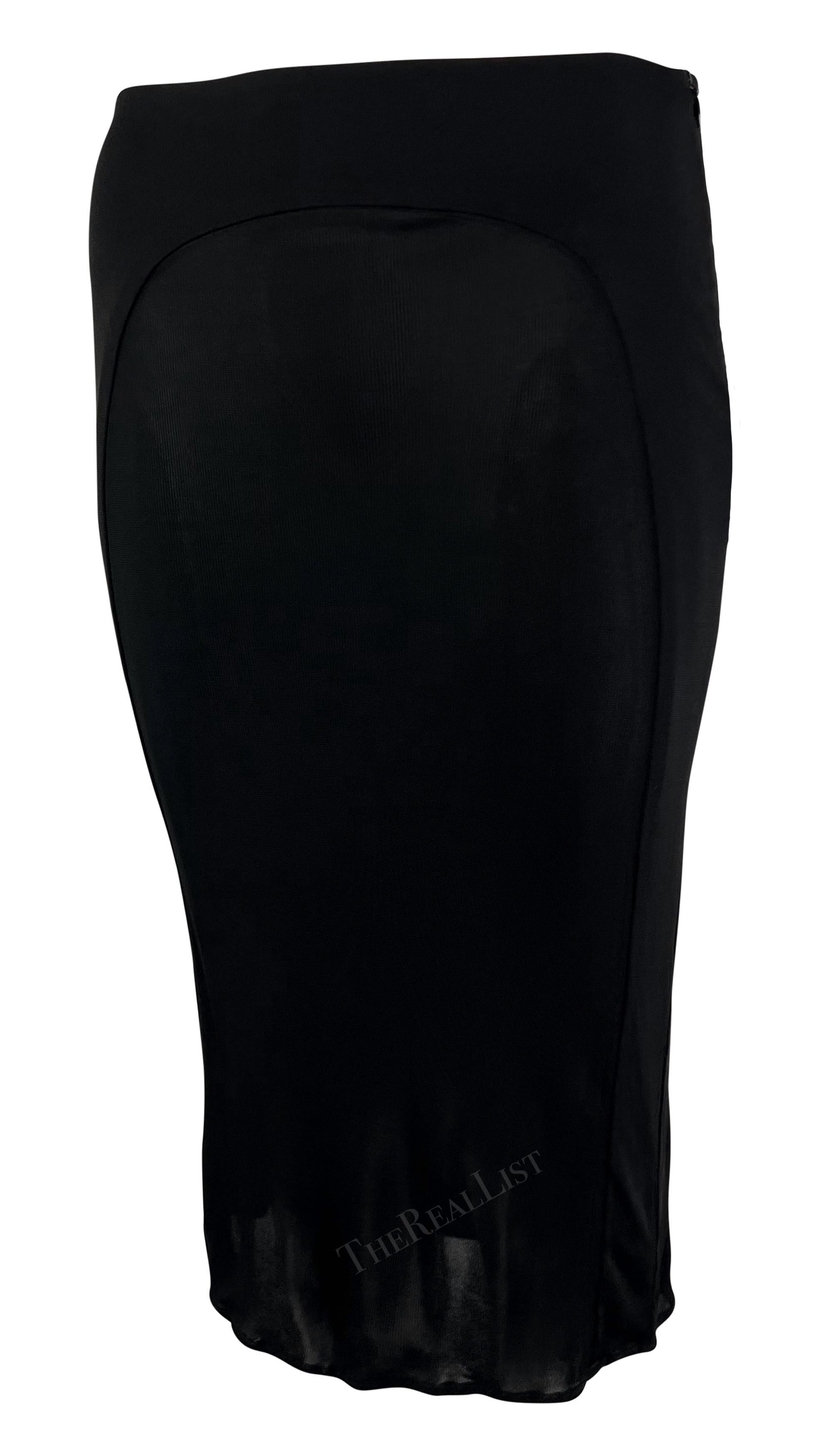 From the early 2000s, this black Yigal Azrouel semi-sheer skirt falls just below the knee. This form-fitting skirt stretches to fit the body and is the perfect elevated closet staple. 

Approximate measurements:
Size - 3 US
Waistband to hem: