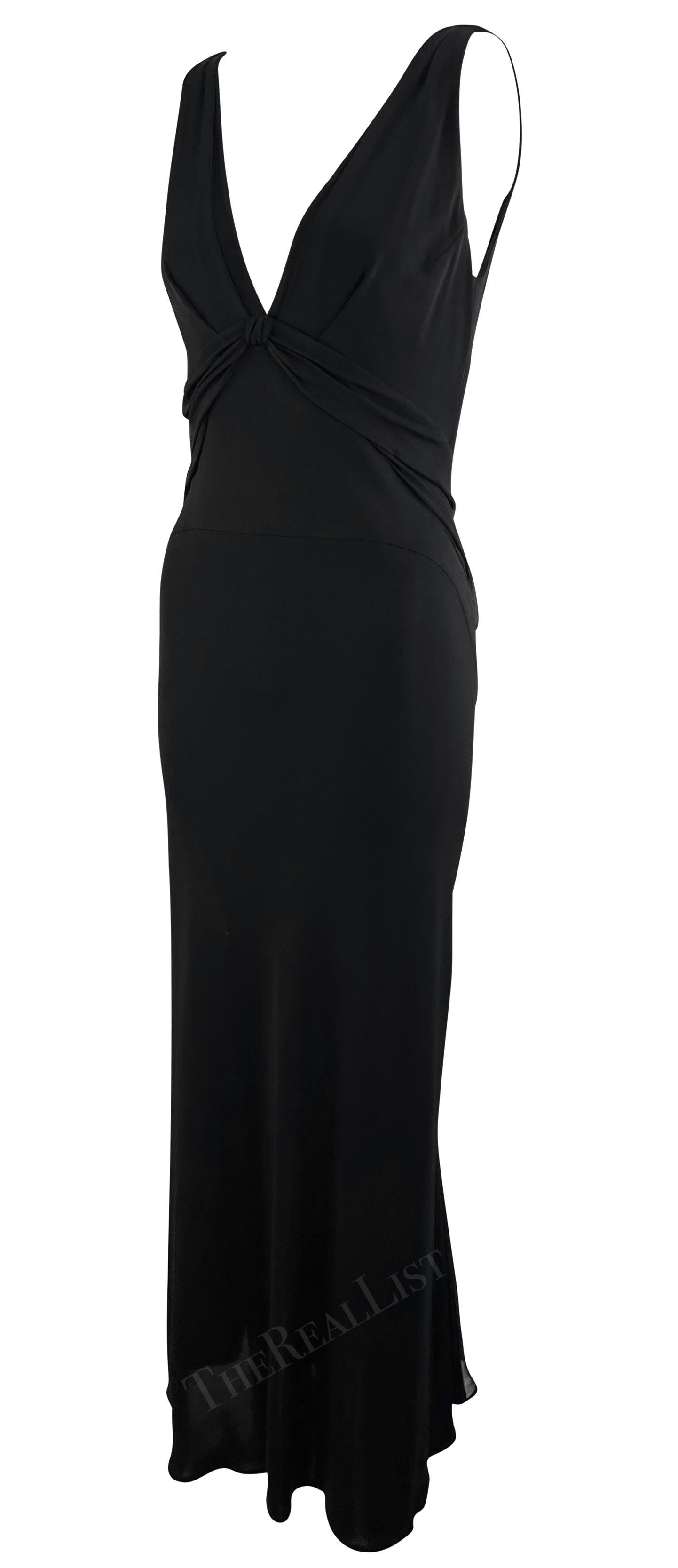 From the mid 2000s, this black bodycon Yigal Azrouël gown is the perfect elevated essential. Easily dressed up or down, this stretchy gown features a plunging v-neckline with a twisted detail under the bust. 

Approximate measurements:
Size -