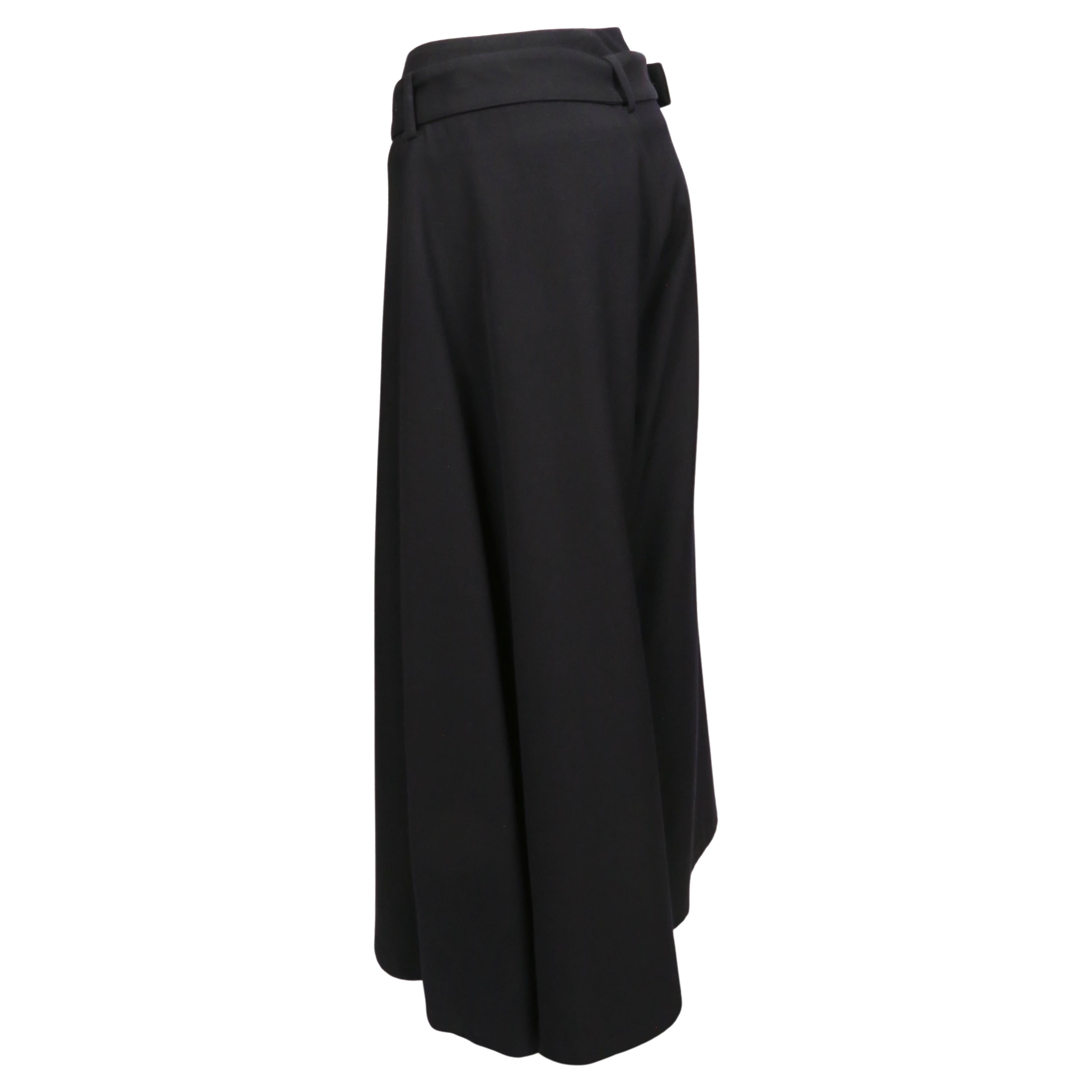 Inky-black, asymmetrical wide leg pants designed by Yohji Yamamoto dating to the 2000's. Japanese size '1'. Approximate measurements: waist 26.5