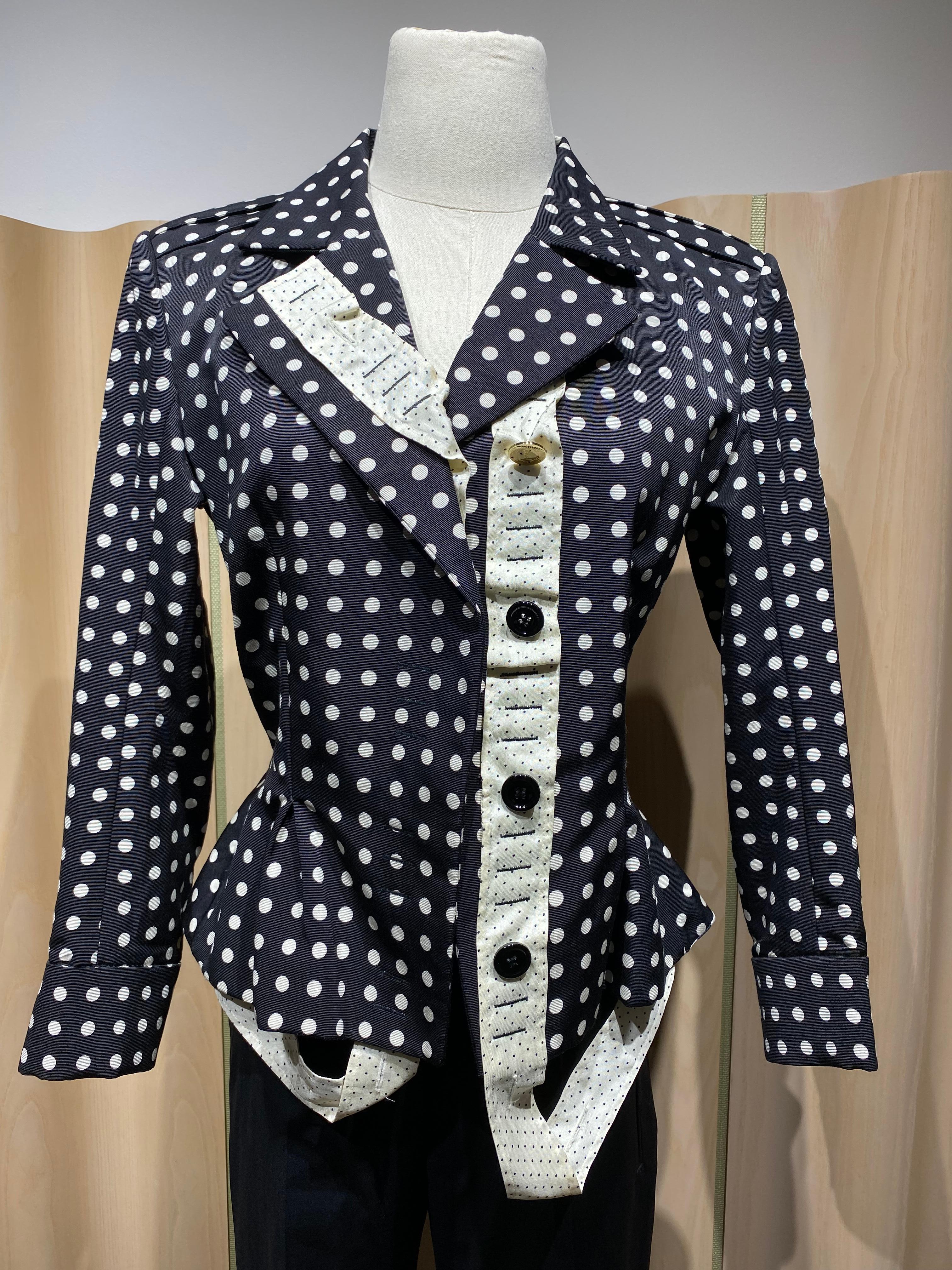 2005 Yves Saint Laurent rive gauche by Stefano Pilati Peplum polkadot Jacket /blazer pant suit.
Jacket is lined in polkadot silk fabric. The suits is in excellent condition.
Size: 36
Jacket Measurement :
Bust: 35” / Waist 28” / Hip: 34” / Sleeve:
