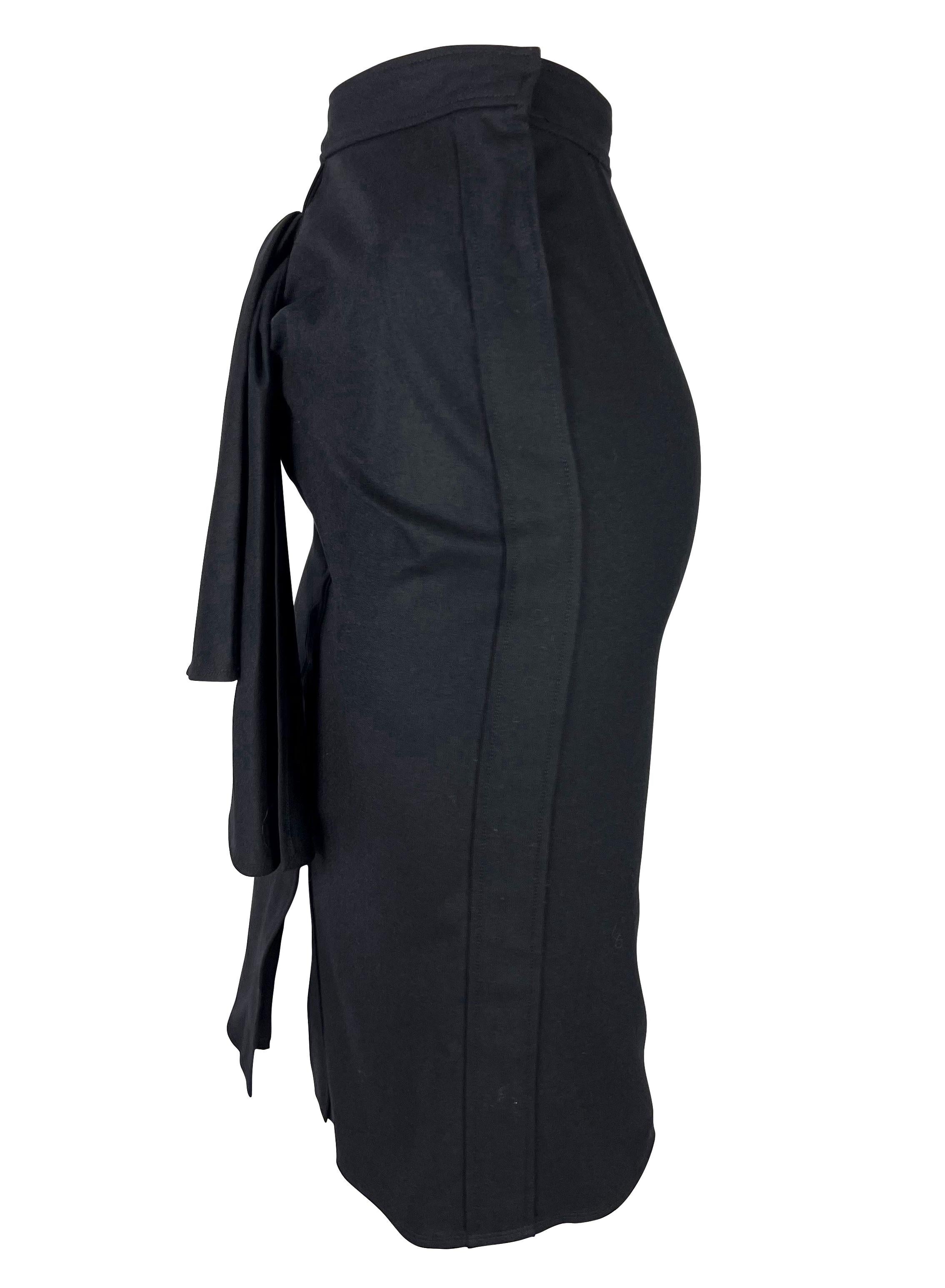 Presenting a beautiful black Yves Saint Laurent Rive Gauche skirt designed by Tom Ford. From the 2000s, this fabulous skirt features ruching and folded fabric at the front.

Approximate measurements:
Size - FR36
Waistband to hem: 26.5”
Waist: