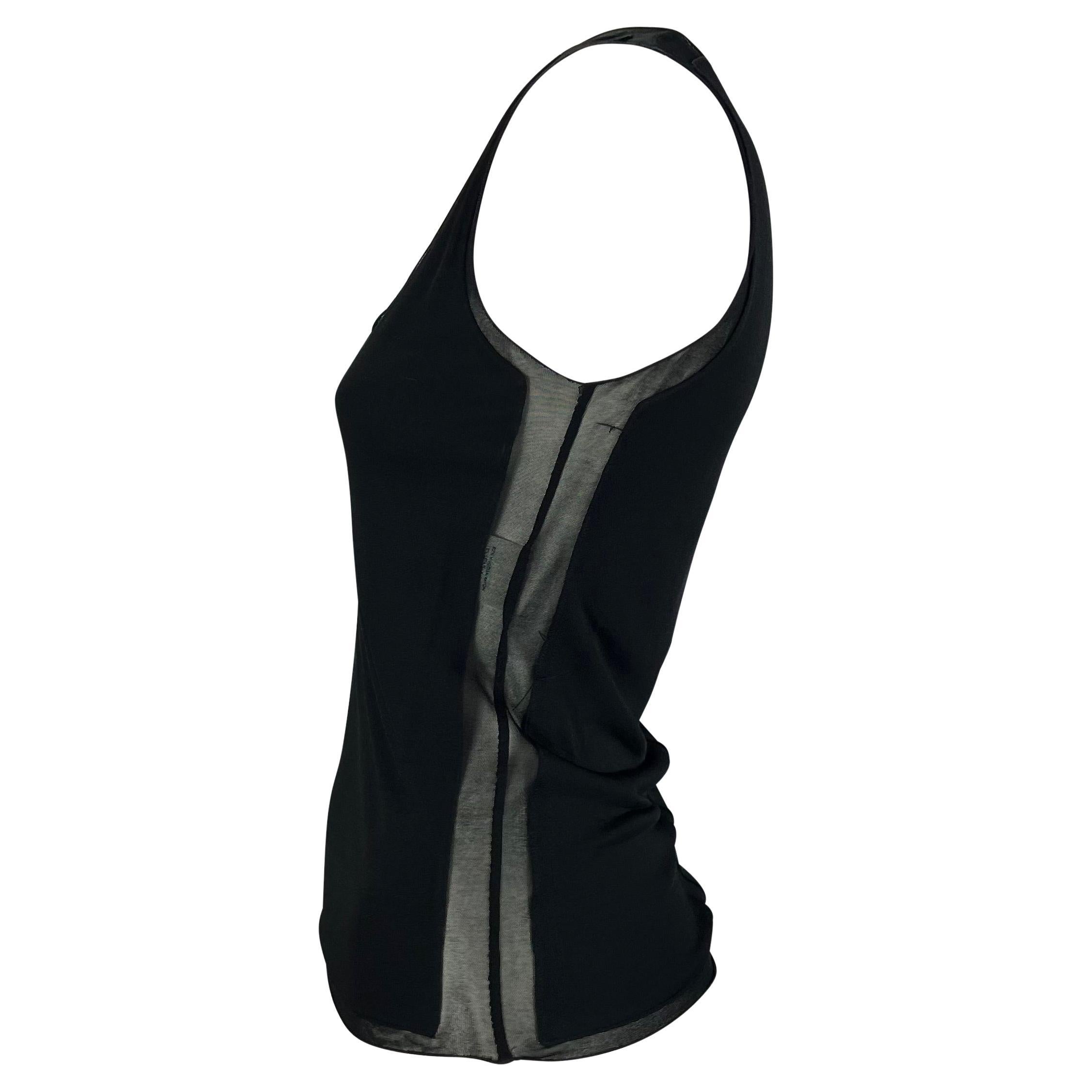 TheRealList presents: a black sheer panel Yves Saint Laurent tank top, designed by Tom Ford. From the early 2000s, this top is elevated with small sheer details around the scoop neckline as well as down the back and on the sides.

Follow us on
