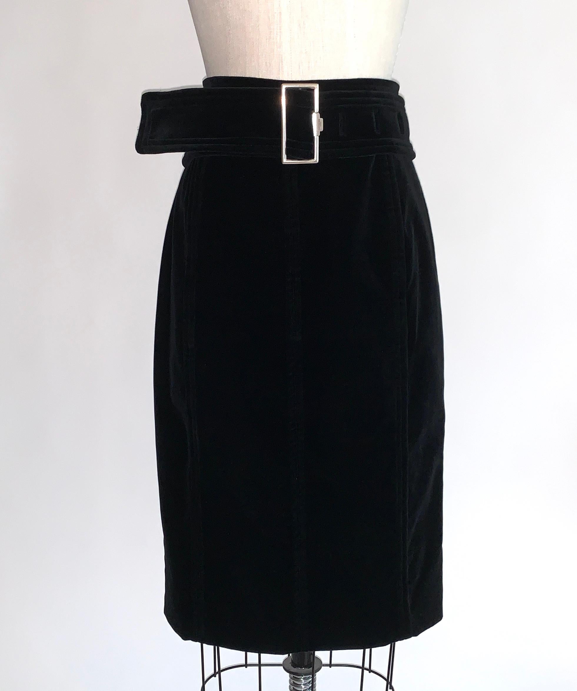 Yves Saint Laurent black velvet Rive Gauche pencil skirt with wide black velvet belt with silver buckle front. Signed Yves Saint Laurent Paris at front buckle, YSL on back zip. No belt loops, so skirt can be worn with or without belt. Back zip and