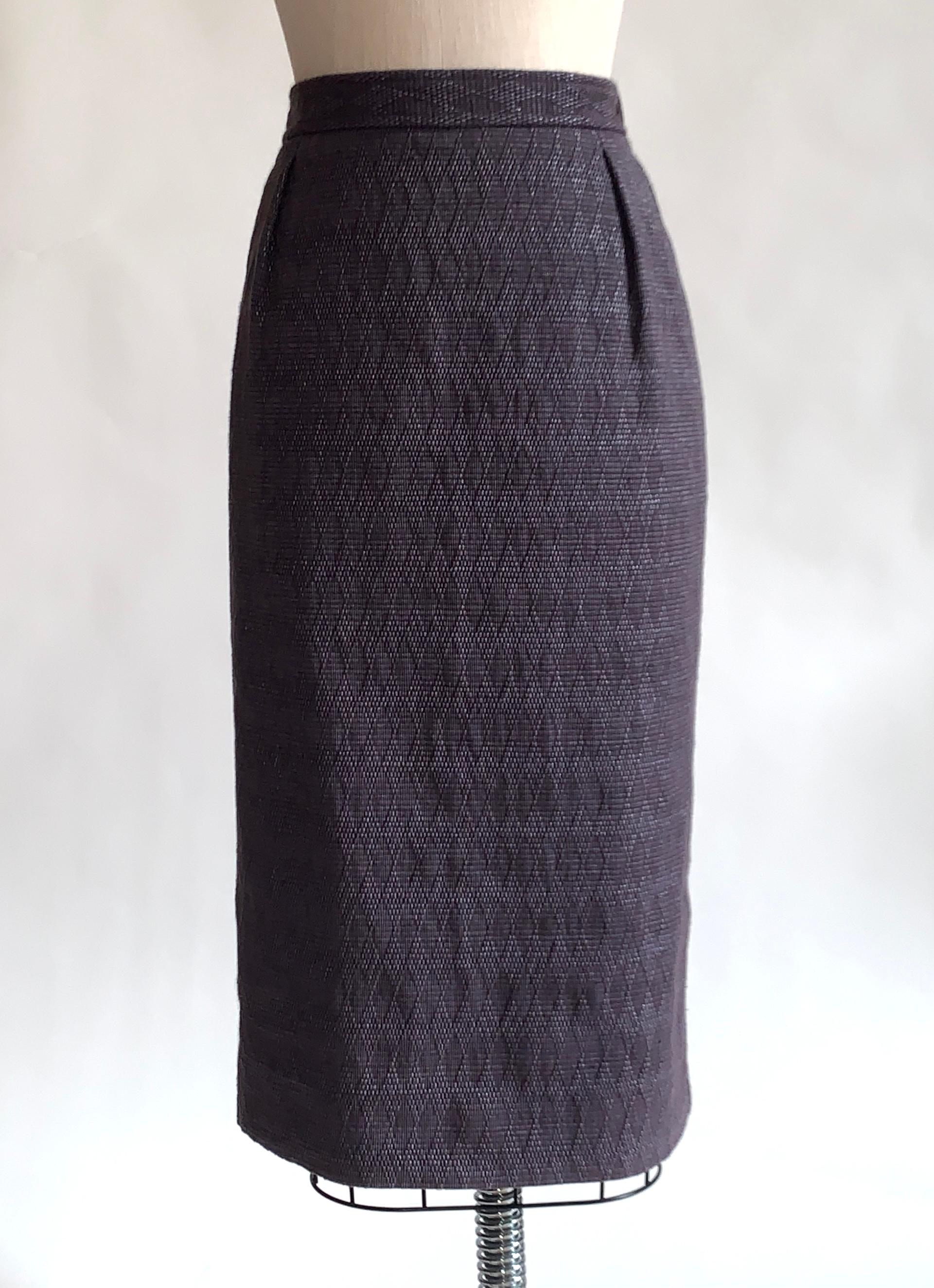 Yves Saint Laurent 2005 Rive Gauche purple pencil skirt in a diamond weave composed of an amazing flax blend that almost feels like a soft woven rubber. Side pockets. Side zip and button closure. 

52% cotton, 27% nylon, 21% flax. 
Fully