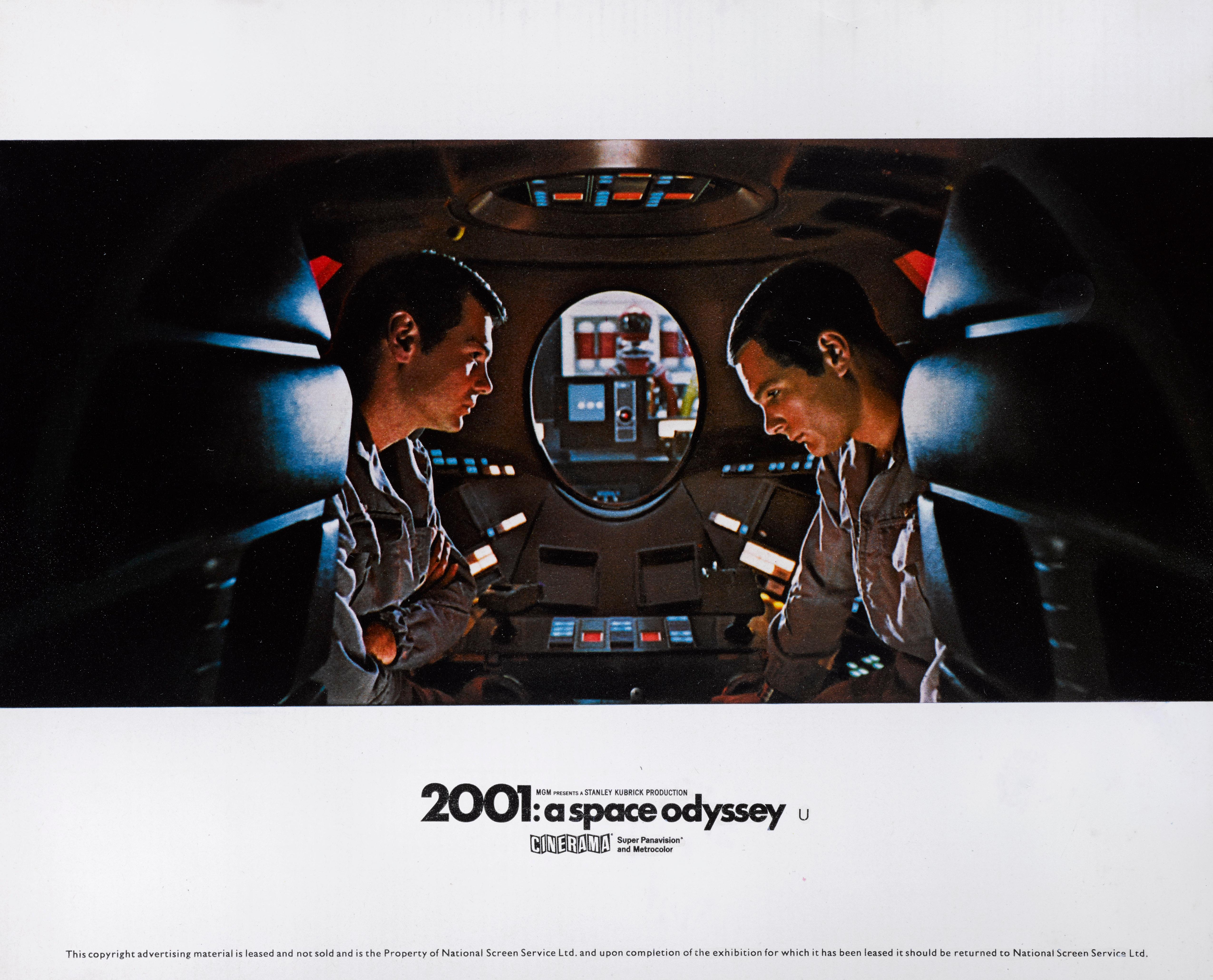 Original color production still for the Cinerama release of Stanley Kubrick's 2001: A Space Odyssey.
The Cinerama release stills are much harder to find and more desirable.
This scene if when the men enter a space pod to avoid being overheard.