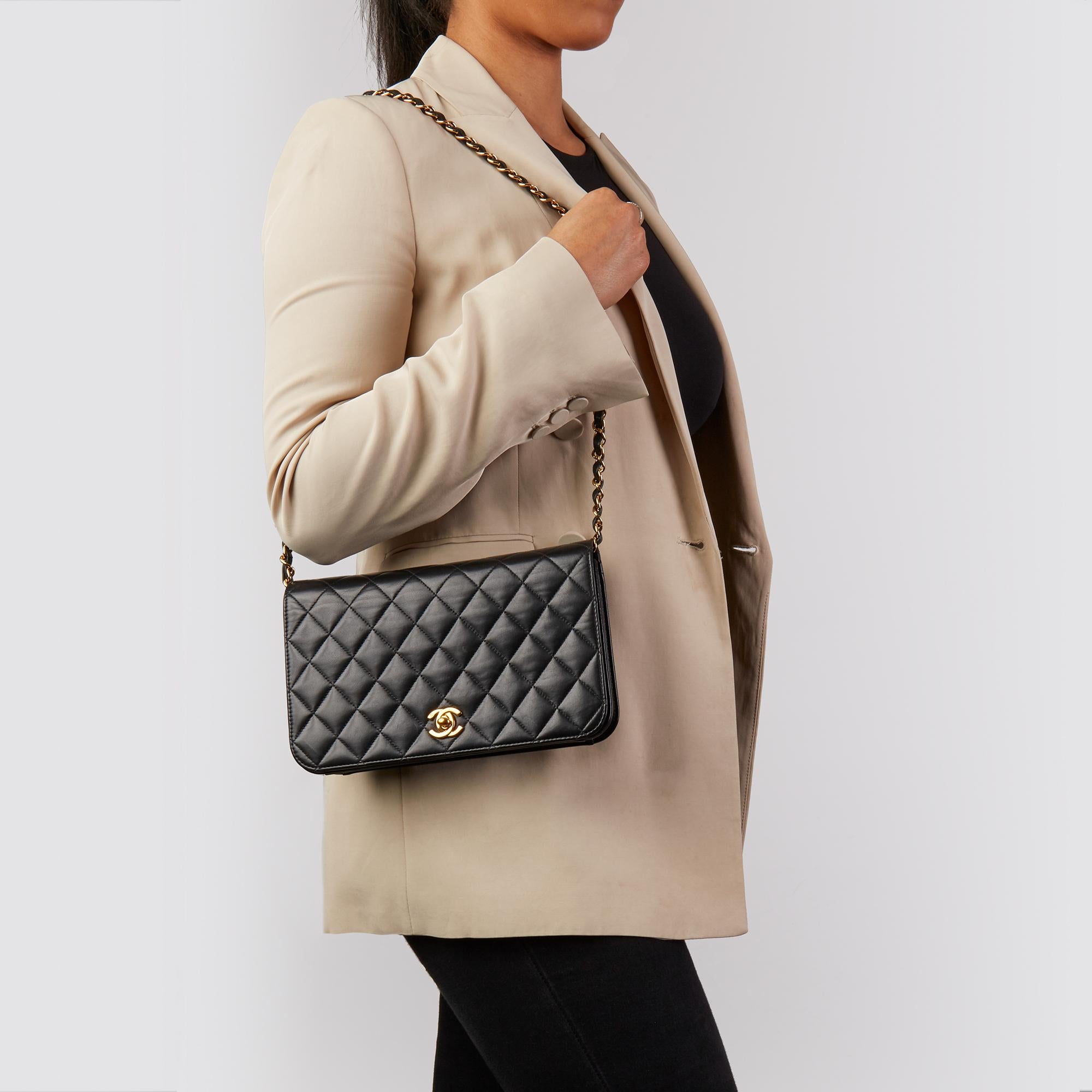 CHANEL
Black Quilted Lambskin Vintage Classic Single Full Flap Bag 

Xupes Reference: HB3468
Serial Number: 6436584
Age (Circa): 2001
Accompanied By: Chanel Dust Bag, Box
Authenticity Details: Serial Sticker (Made in France)
Gender: Ladies
Type:
