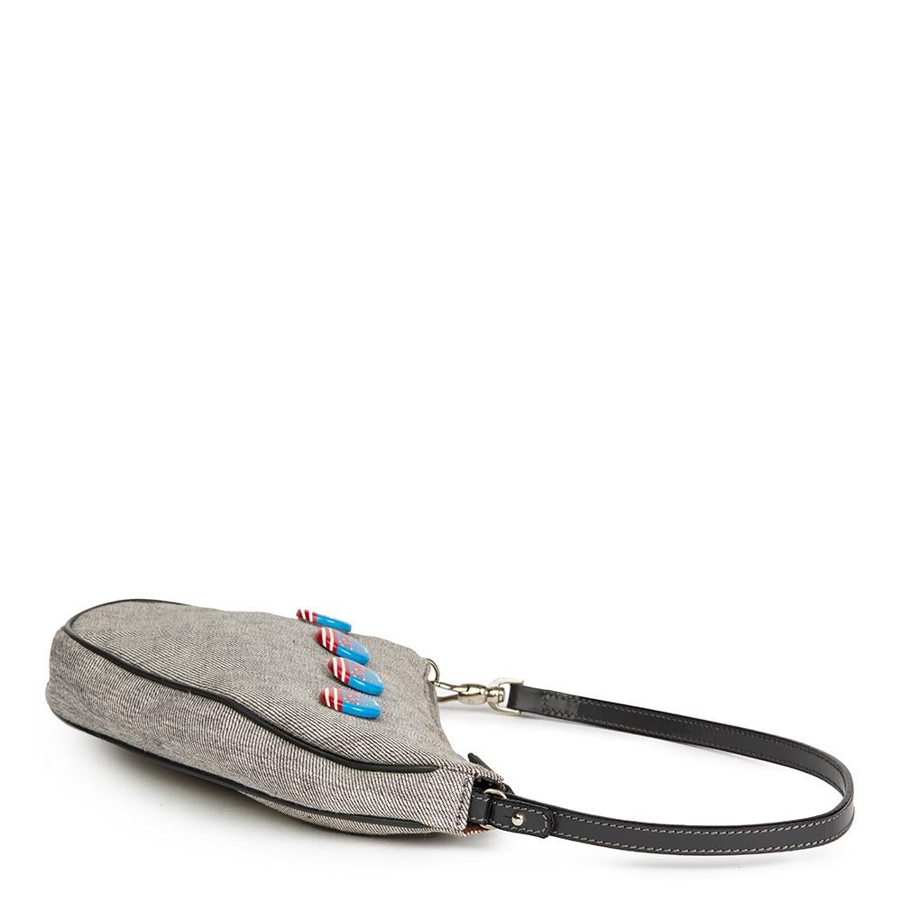 CHRISTIAN DIOR
Grey Denim Saddle Pouch

Xupes Reference: HB2312
Serial Number: PZ0401
Age (Circa): 2001
Authenticity Details: Serial Stamp (Made in Italy)
Gender: Ladies
Type: Top Handle, Clutch

Colour: Grey
Hardware: Silver
Material(s):