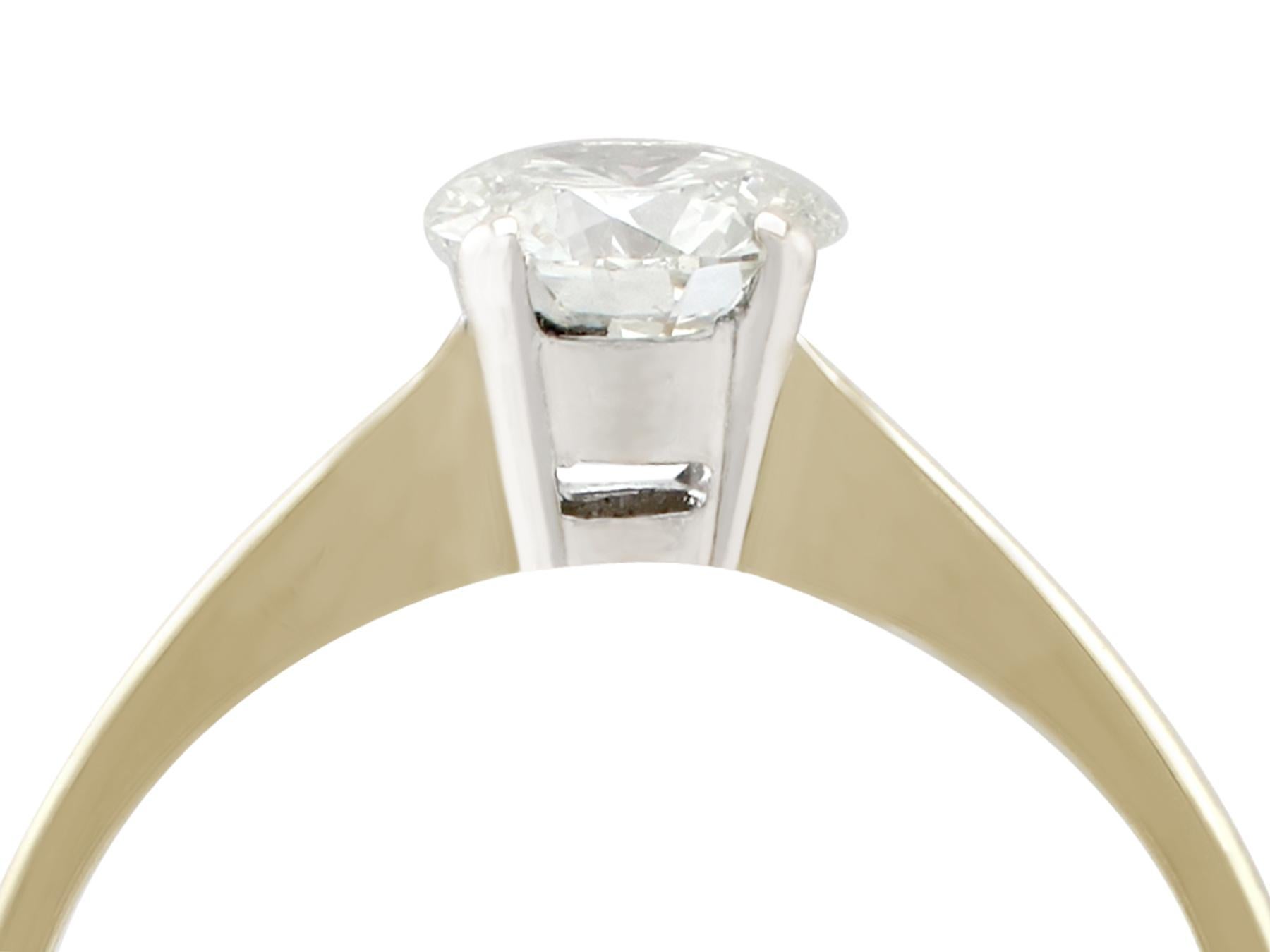 An impressive contemporary 0.61 carat diamond and 18 carat yellow gold, 18 karat white gold set solitaire ring; part of our diverse diamond jewellery collections.

This fine and impressive diamond solitaire ring has been crafted in 18k yellow gold