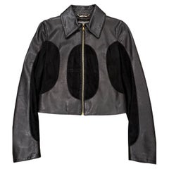 2001 Dolce
Gabbana cropped leather jacket with velvet panel inserts 2001 Dolce
Gabbana cropped leather jacket with velvet panel inserts