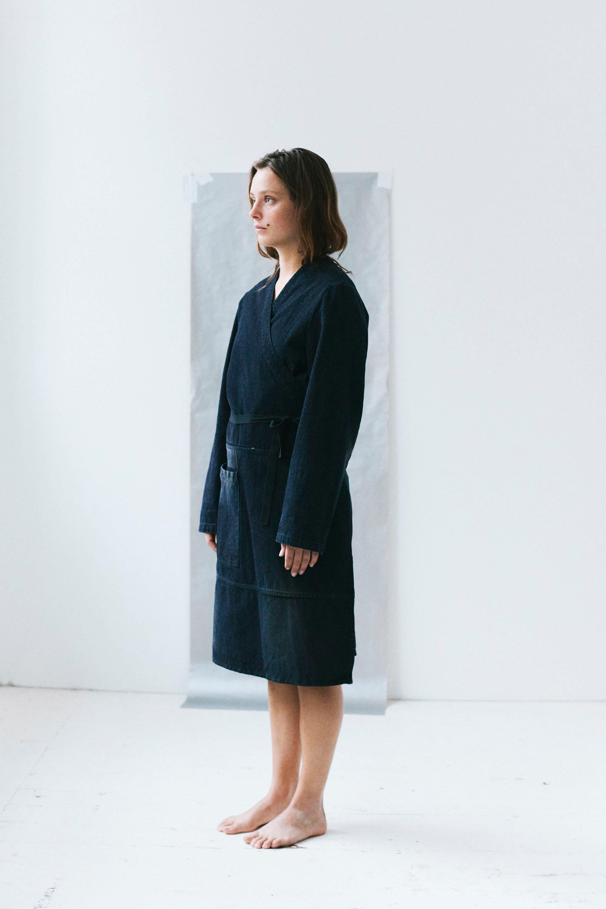 2001 Maison Martin Margiela denim utilitarian wrap dress/jacket. Belted wrap dress with single large external pocket. Line 6. Very good condition, areas of fading (as shown)