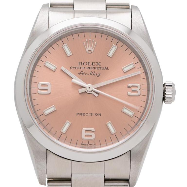 2001 Rolex Air King Model 14000m

Additional Information:
Maker: Rolex
Model: 14000M
Year: 2001
Material: Stainless Steel
Dial: Original Salmon
Movement: Automatic
Case Measurement: 34mm
Weight: 89g
Size: Fits up to a size 8 Adjustable
Condition: