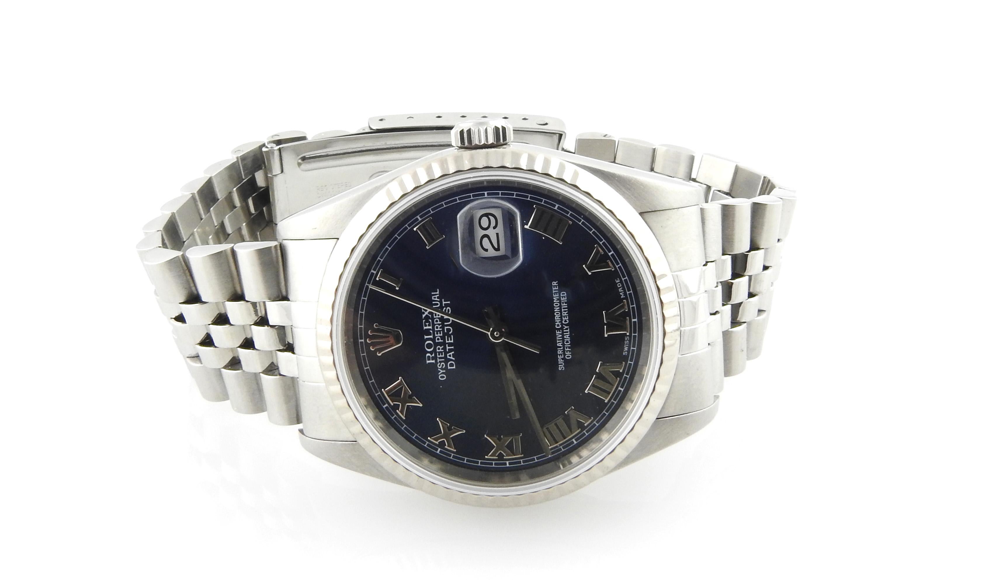 Rolex Men's Datejust Watch



Model: 16234

Serial: K762565



2001 Rolex midsize watch 



36mm case size



Stainless steel case with 18K white gold bezel



Blue dial with silver Roman markers



Jubilee band - fits up to 7 1/2