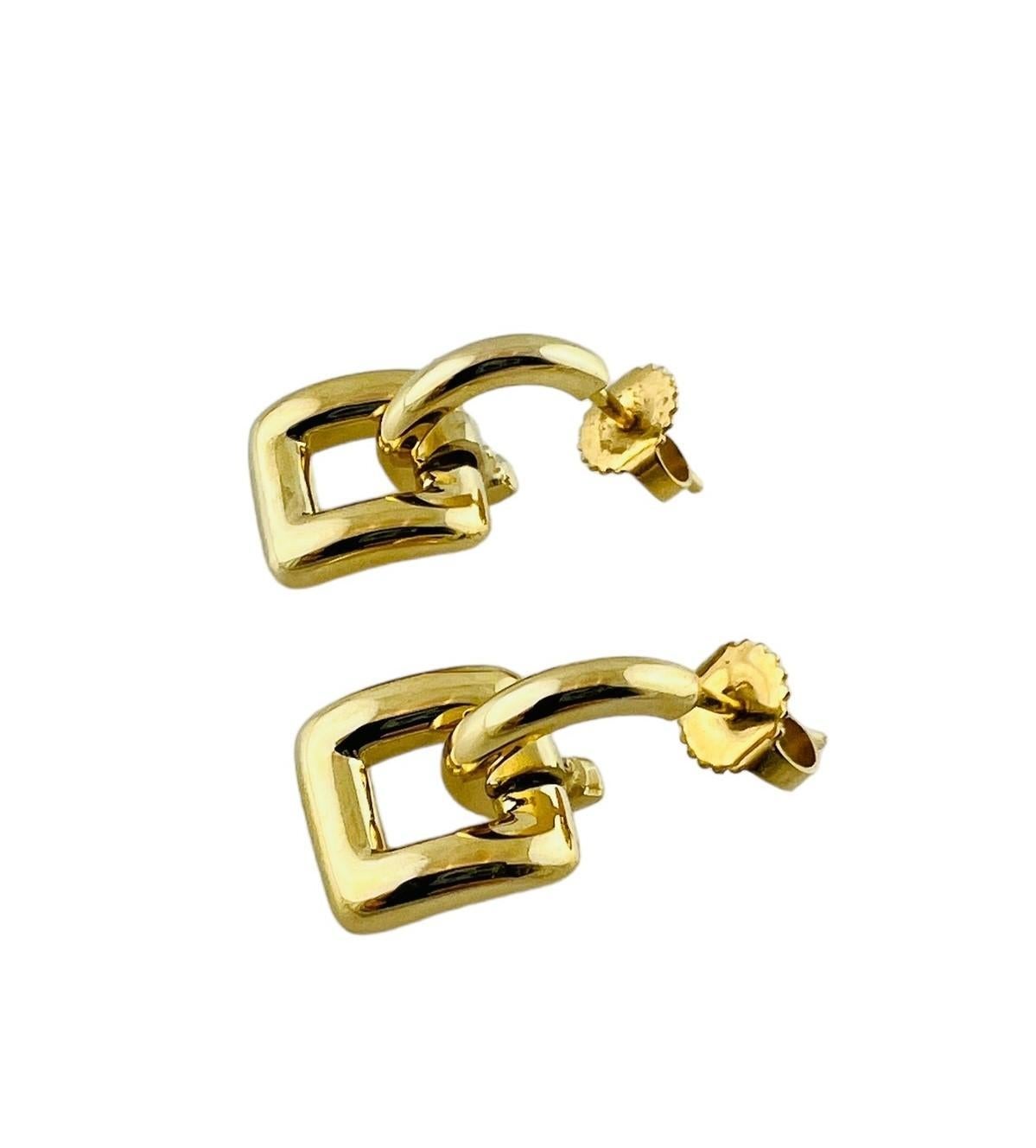 Vintage 2001 Tiffany & Co. 18K Yellow Gold Door Knocker Square Buckle Earrings

These door knocker style gold earrings by Tiffany & Co. are set in 18K yellow gold

Earrings are approx. 18 mm in length and 11 mm wide

Stamped 2001 T & Co. 750