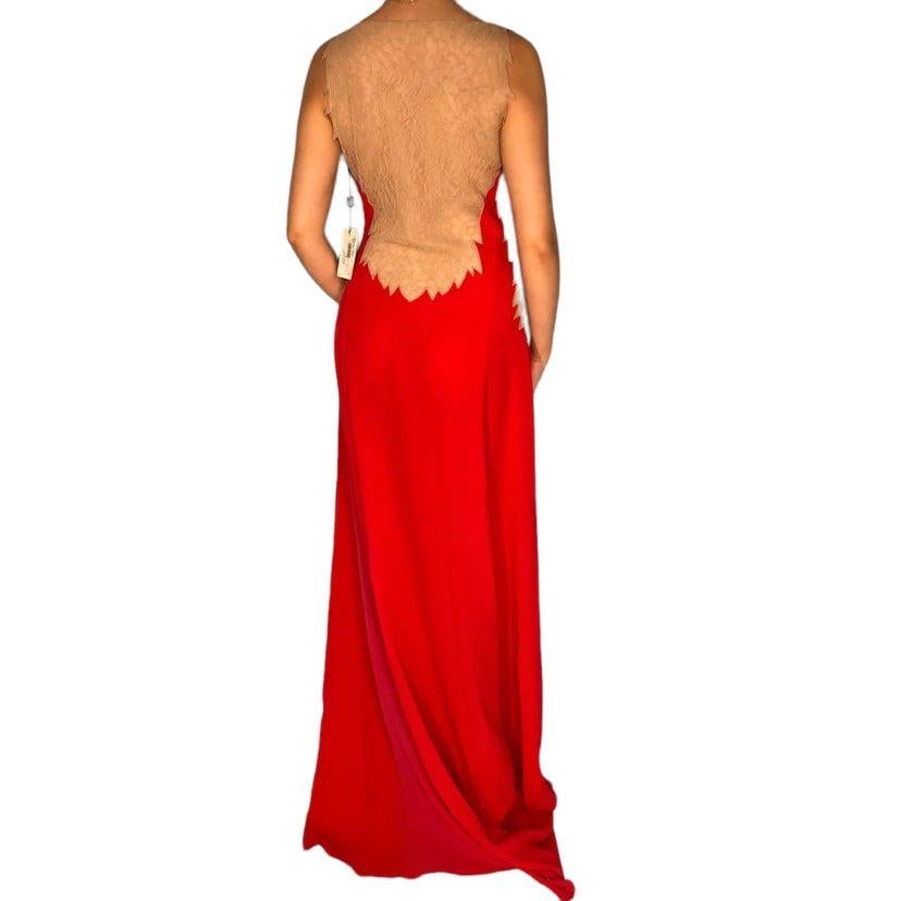 Vintage Gianni Versace Couture Red Silk Lace Gown
Red Chiffon, Nude Lace
Circa 2001
IT Size 42
Made in Italy
Excellent condition
New, with tags!

