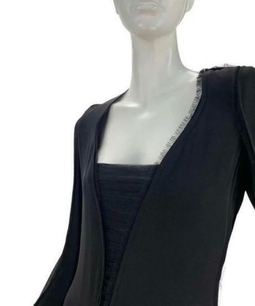 2001 Yves Saint Laurent by Tom Ford Robe en soie bordée de franges - Nouveau avec étiquettes

Trésor de collection ultra-rare de la période provocatrice de Tom Ford chez YSL, cette robe midi en soie noire de 2001 est l'incarnation du minimalisme