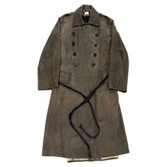2002 Ann Demeulemeester distressed leather double-breasted belted coat
