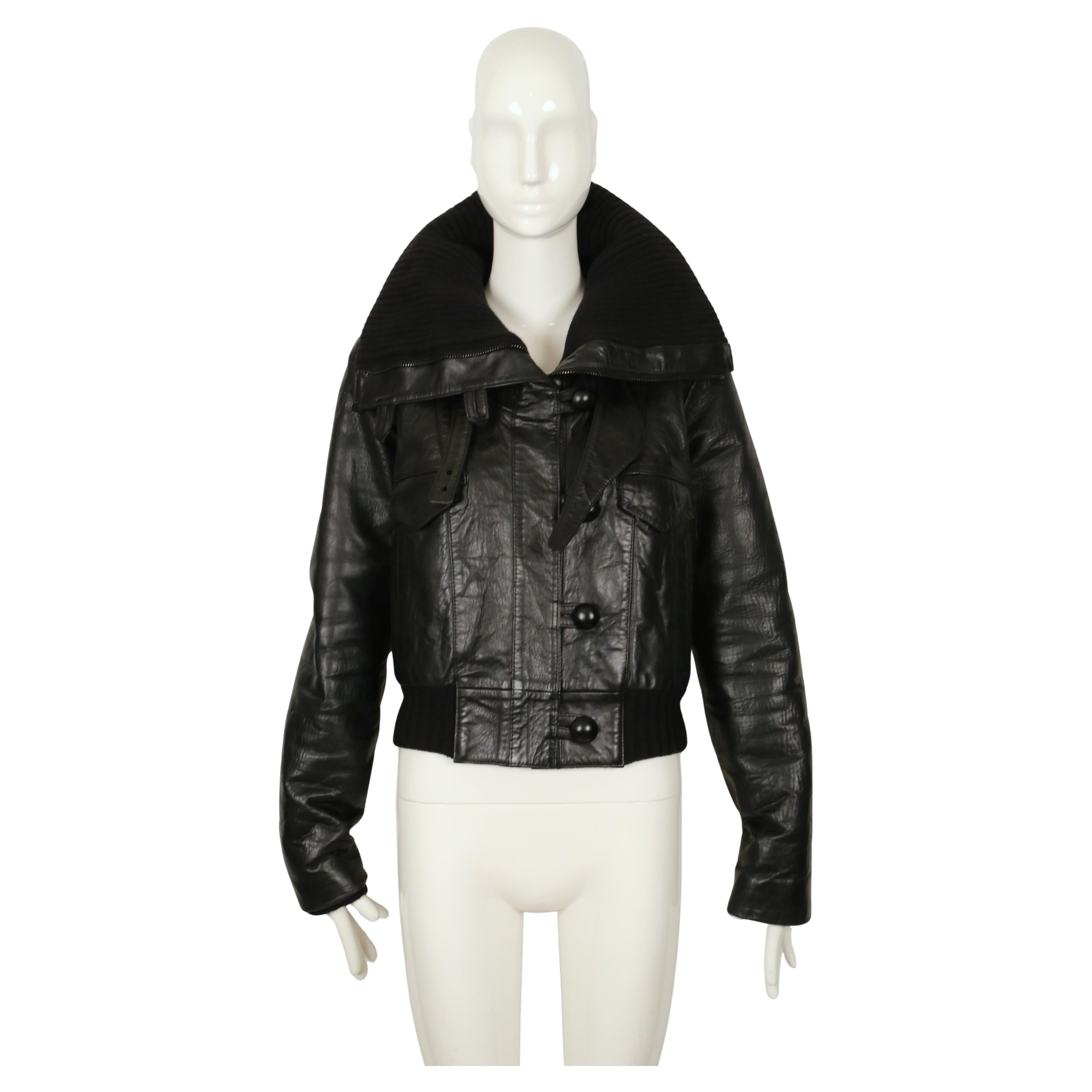 Very rare documented leather coat with ribbed wool trim and oversized collar designed by Nicolas Ghesquière for Balenciaga as seen on the runway as the opening look for fall of 2002. Jacket size label is missing although I believe this is a French
