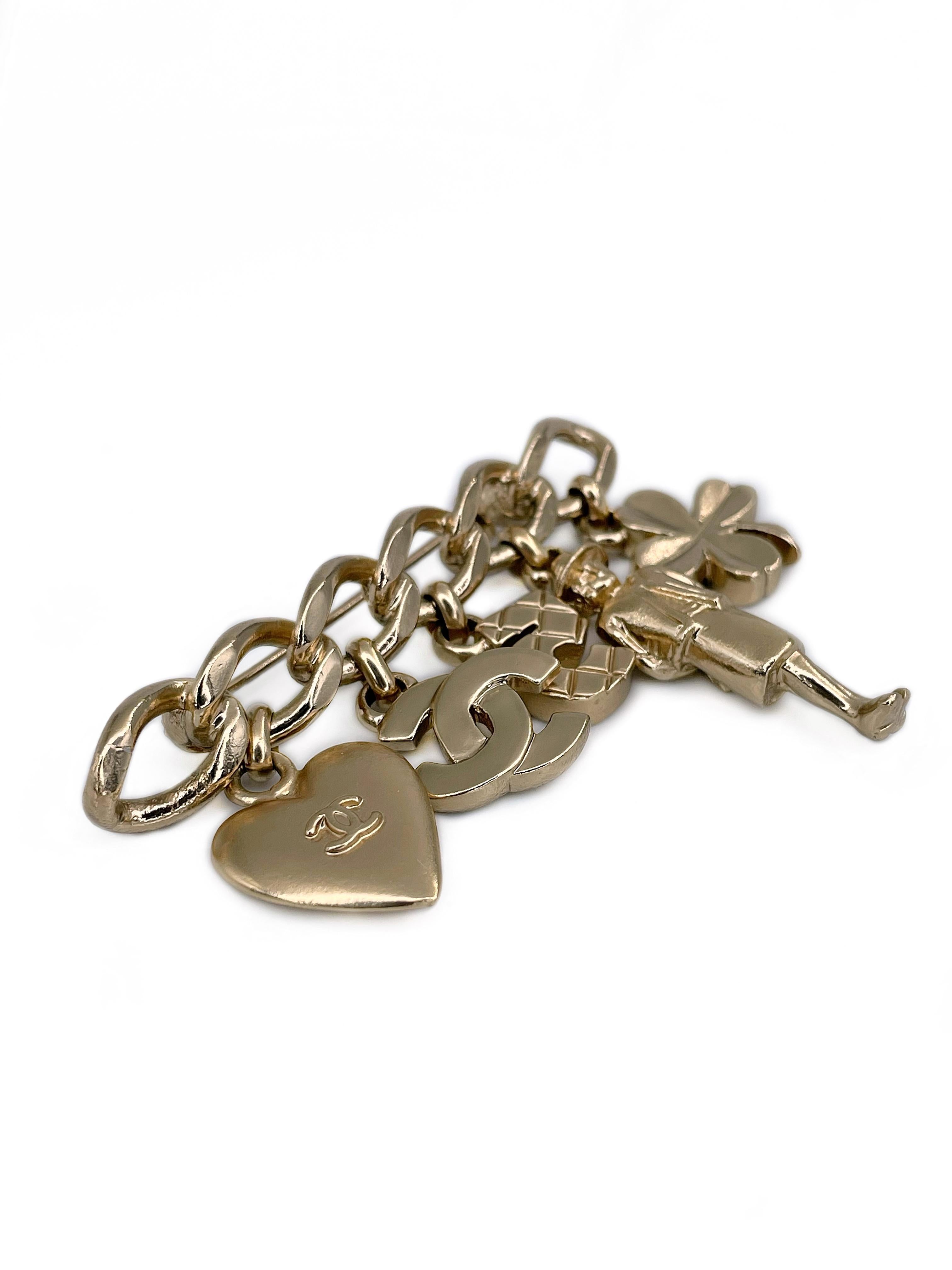 Modern 2002 Chanel 02P Gold Tone CC Logo Heart Number Five Clover Charm Bar Brooch For Sale