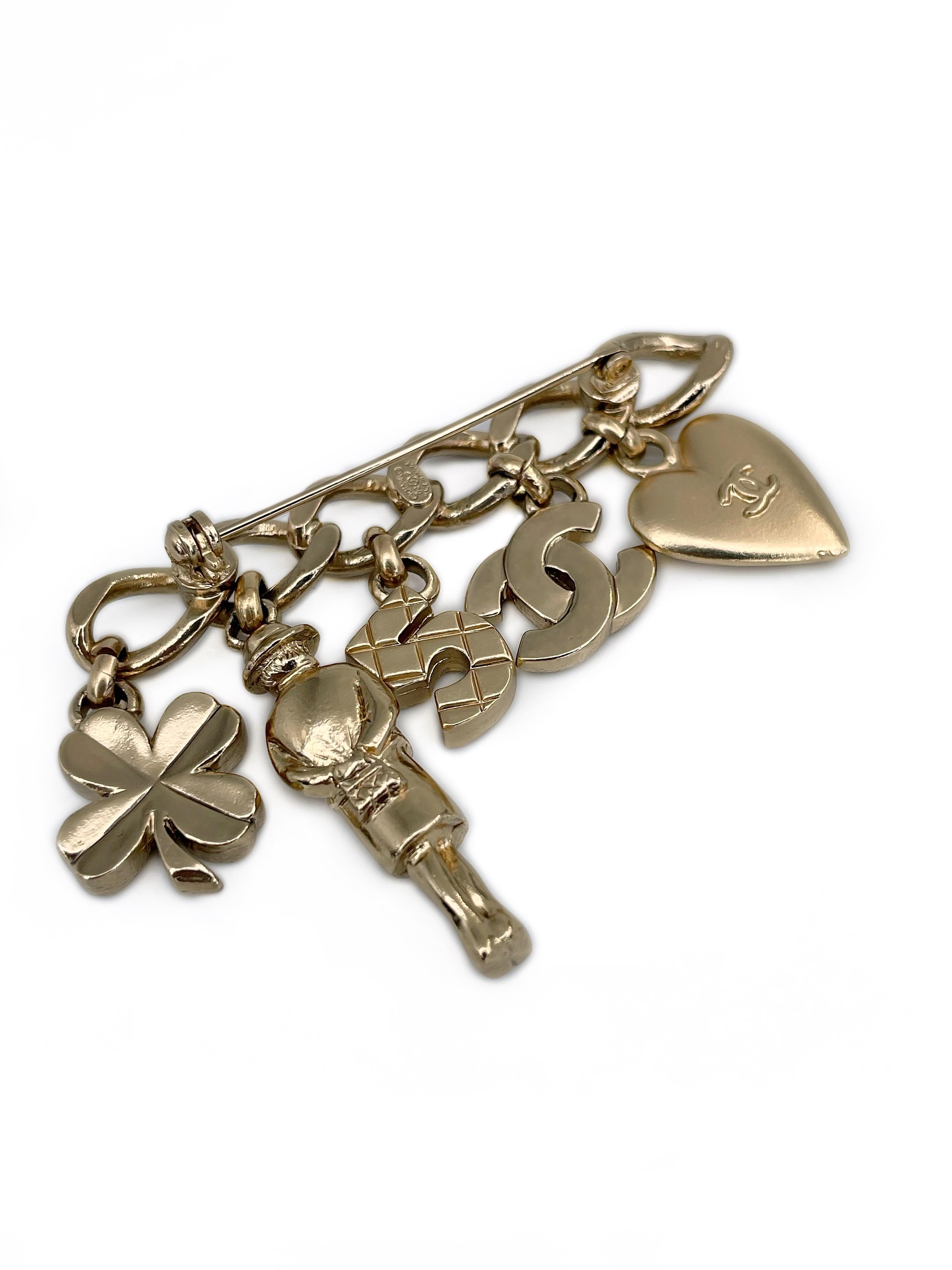 Women's 2002 Chanel 02P Gold Tone CC Logo Heart Number Five Clover Charm Bar Brooch For Sale