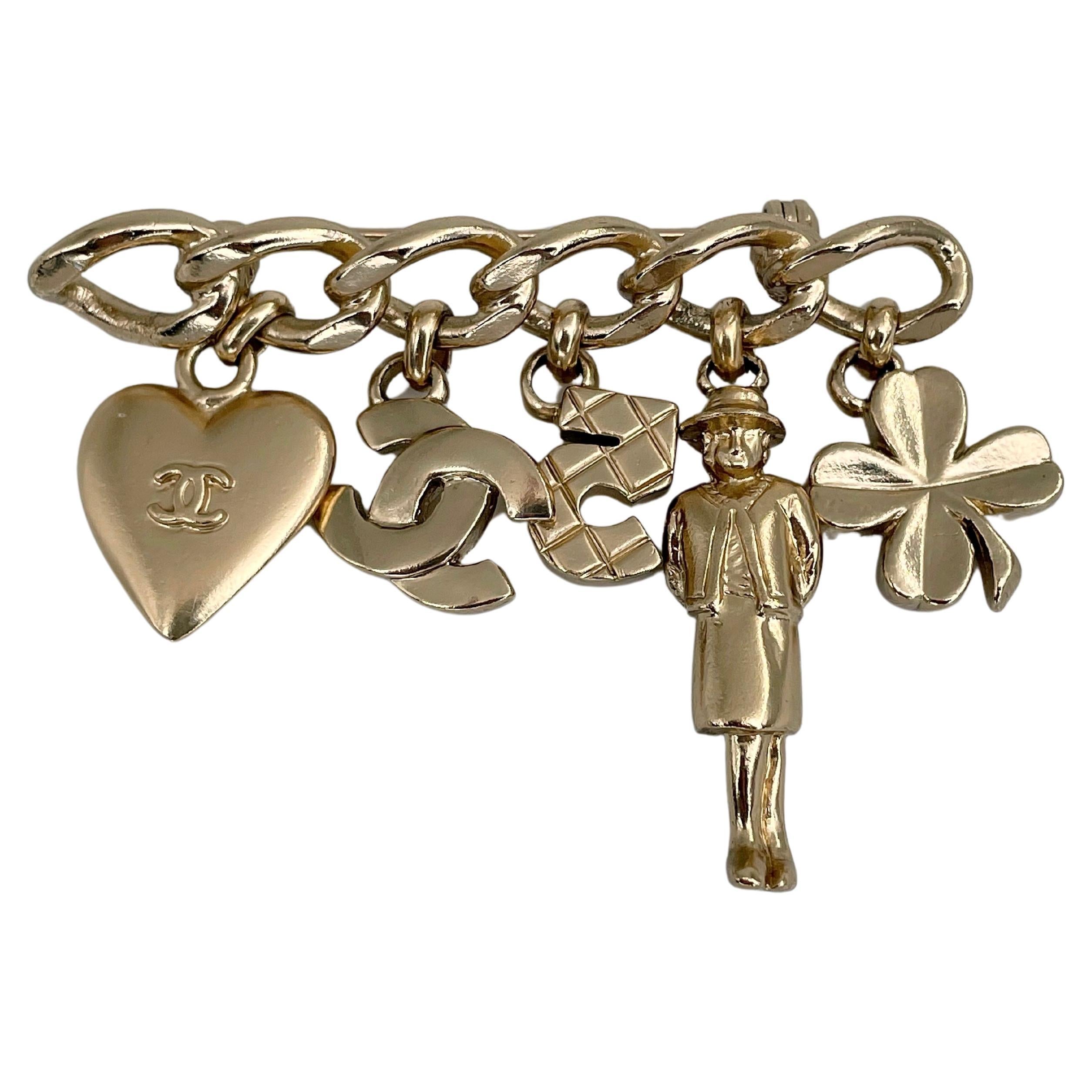 2002 Chanel 02P Gold Tone CC Logo Heart Number Five Clover Charm Bar Brooch
