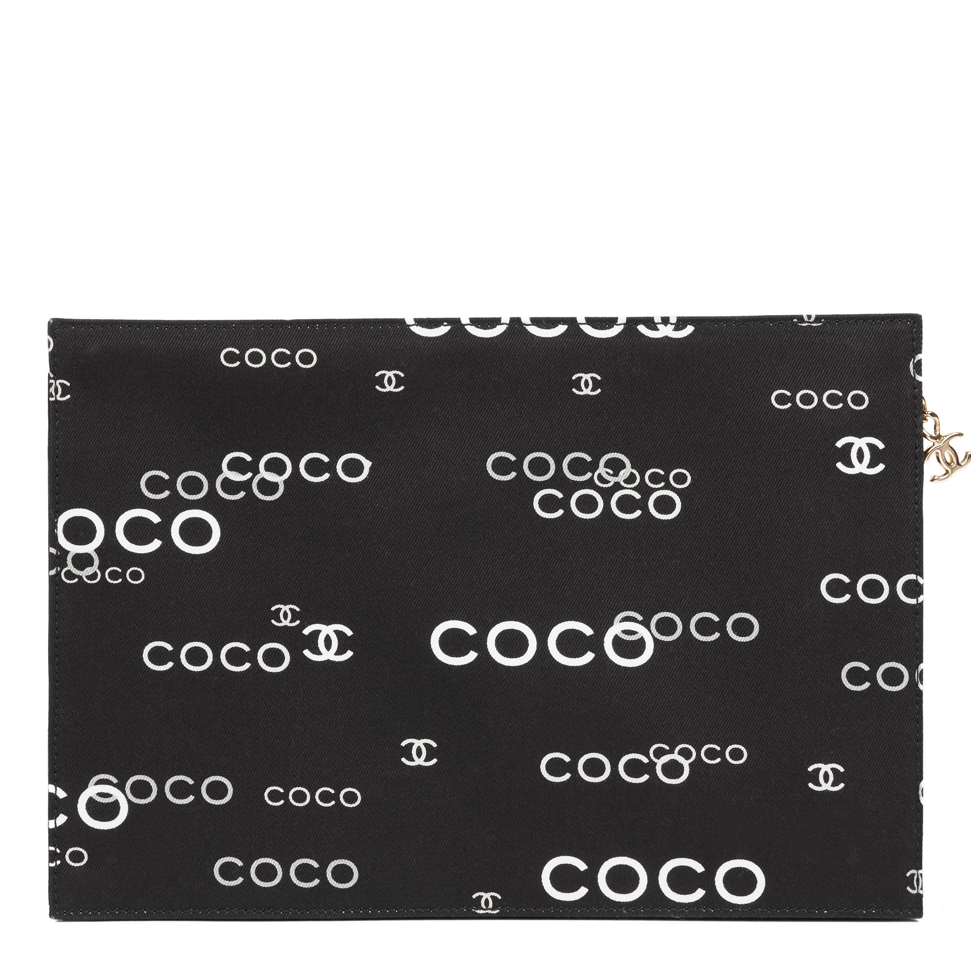 CHANEL
Black Canvas Coco Pouch

Reference: HB2720
Serial Number: 7219494
Age (Circa): 2002
Accompanied By: Care Booklet
Authenticity Details: Serial Sticker (Made in Italy)
Gender: Ladies
Type: Accessory, Clutch

Colour: Black
Hardware: