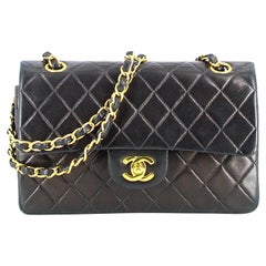 2002 Chanel Black Timeless bag with golden hardware