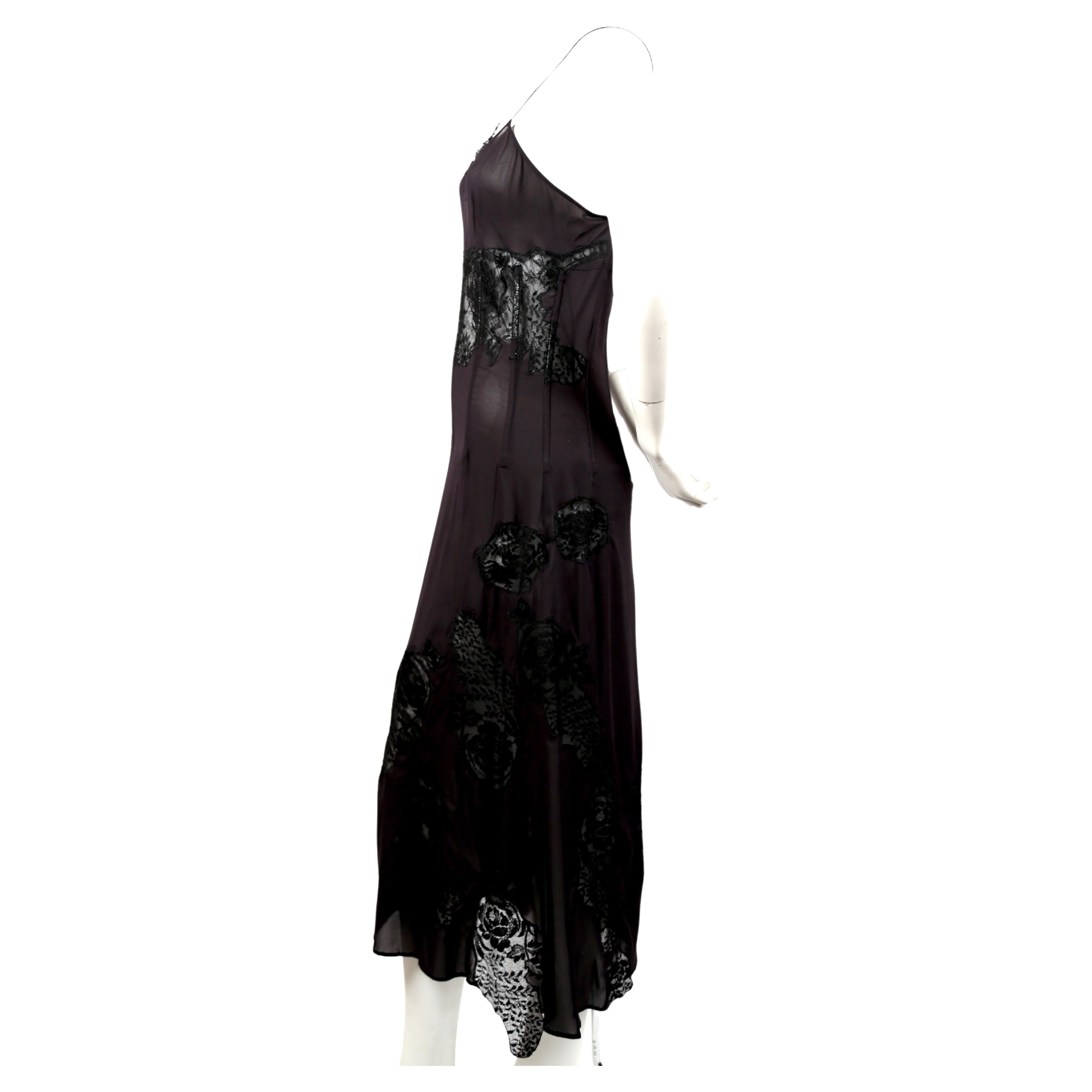 Jet-black lace and chiffon corset dress designed by Dolce & Gabbana exactly as seen on the spring 2002 runway. Italian size 44. Approximate measurements: 34