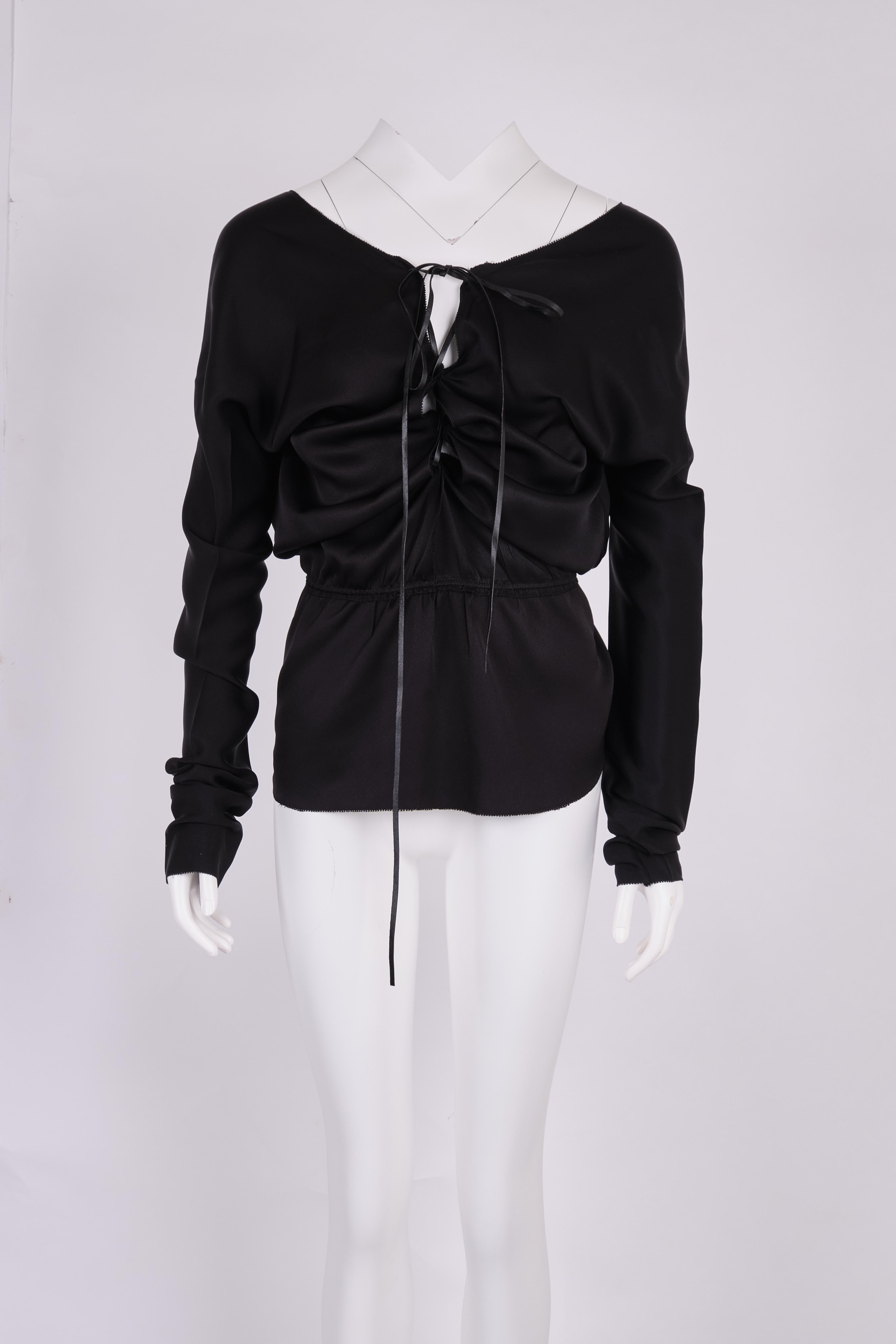 2002 f/wGucci by Tom Ford Silk Lace-Up Top
New with tag
Size 42, fits XS-M