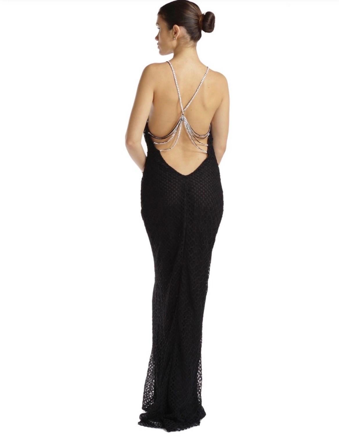 2002 Vintage Gianni Versace Couture
Italian size 46 - US 8-10 (fabric is very stretchy and hugs every curve)
Black Lace Gown with Crystals.
Its totally romantic, stunningly beautiful, certainly feminine and incredibly sexy.
Chiffon silk lining with