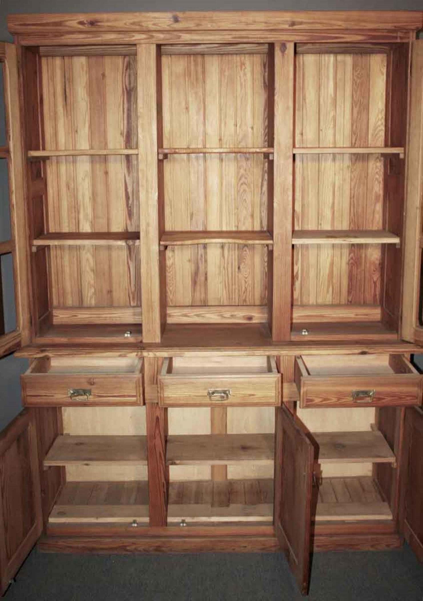 2002 handmade heart pine hutch. Price includes glass for doors and shelves for the center section. Never painted.