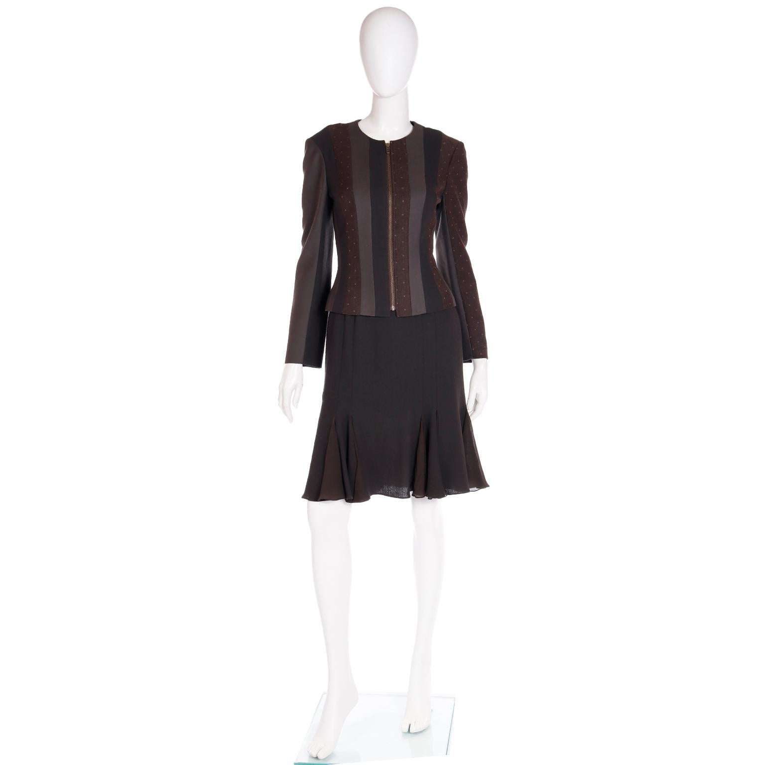 This vintage John Galliano Fall/Winter 2002 dress and jacket suit is perfect for adding style and sophistication to any wardrobe. Featuring a brown wool sleeveless dress with a godet hem, and a jacket with vertical stripes of different brown