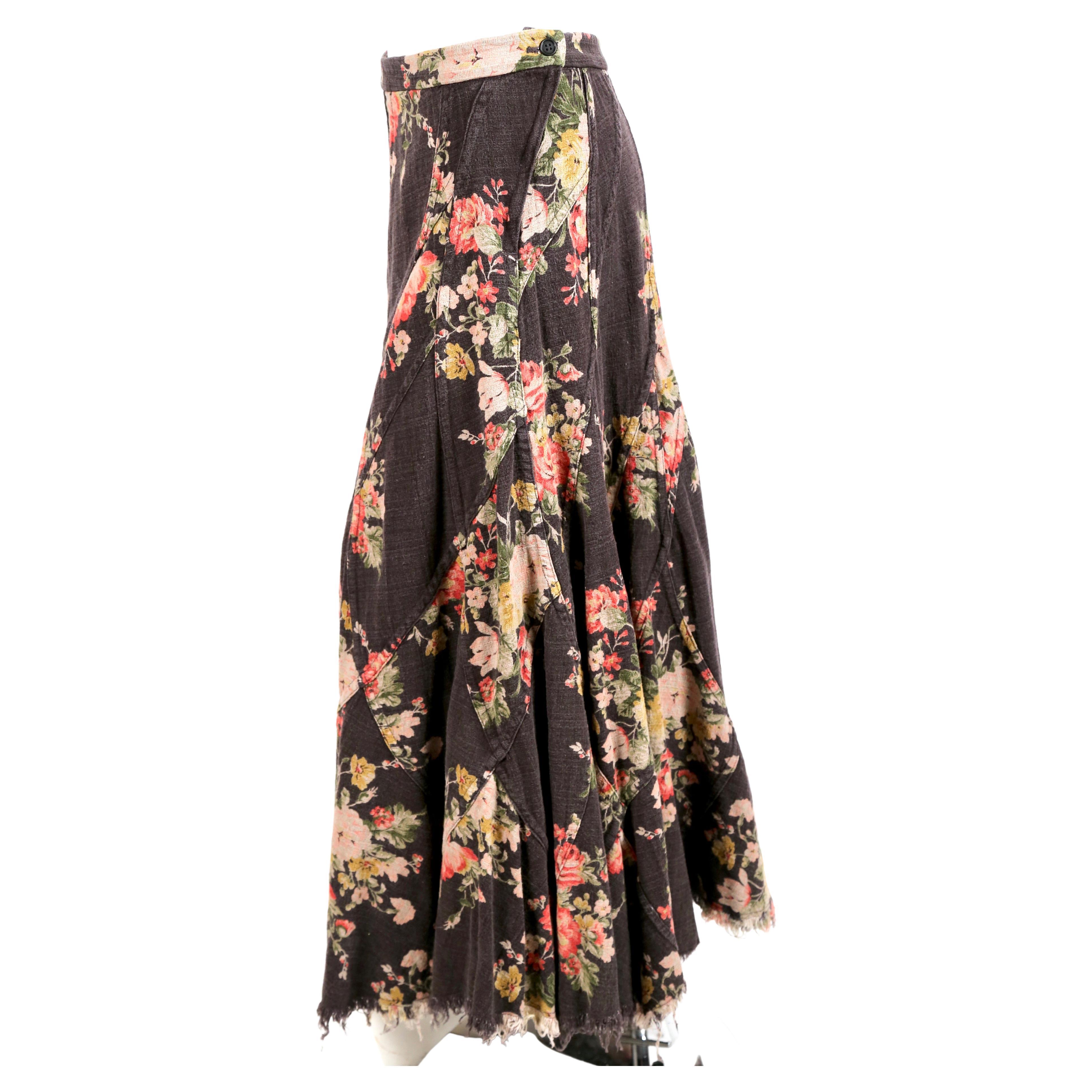Floral printed cotton skirt with amazing seams and frayed hemline designed by Junya Watanabe for Comme Des Garcons as seen on the spring 2002 runway. Very flattering shape.  Size M. Approximate measurements: waist 30