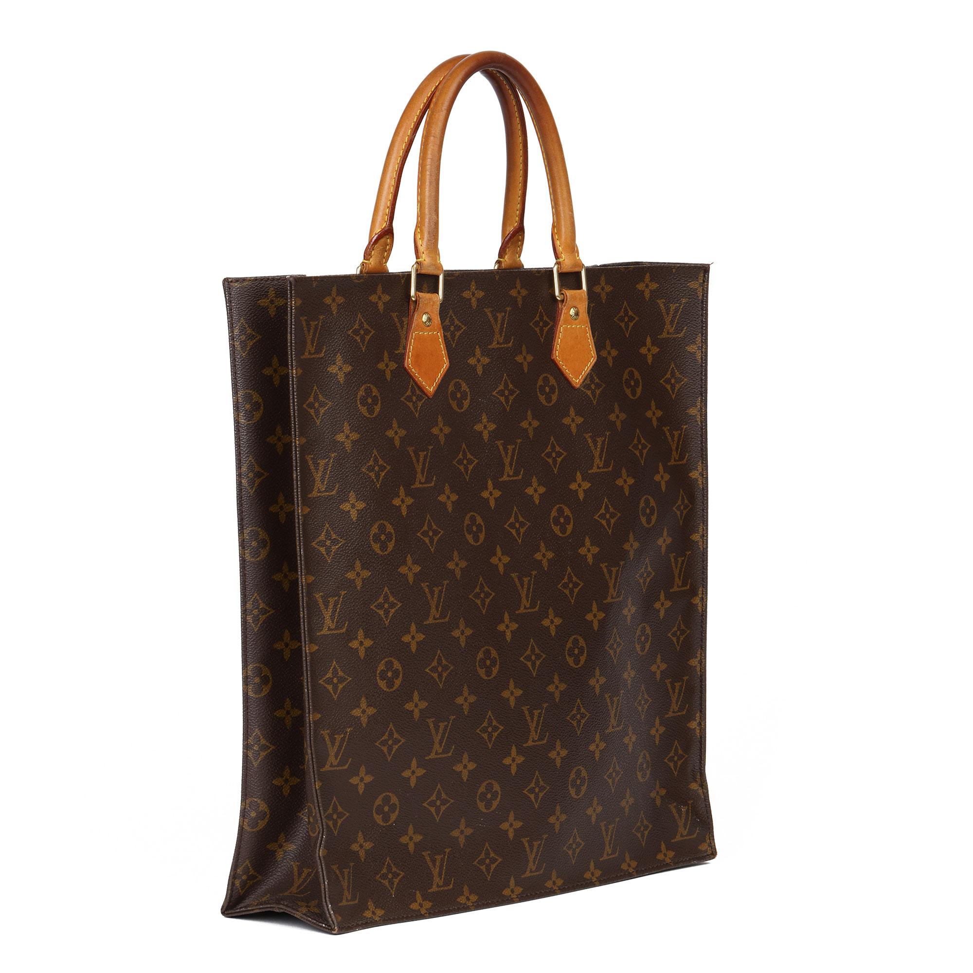 LOUIS VUITTON 
Brown Monogram Coated Canvas & Vachetta Leather Sac Plat

Xupes Reference: CB366
Serial Number: MI0052
Age (Circa): 2002
Accompanied By: Louis Vuitton Dust Bag
Authenticity Details: Date Stamp (Made in France) 
Gender: Ladies
Type: