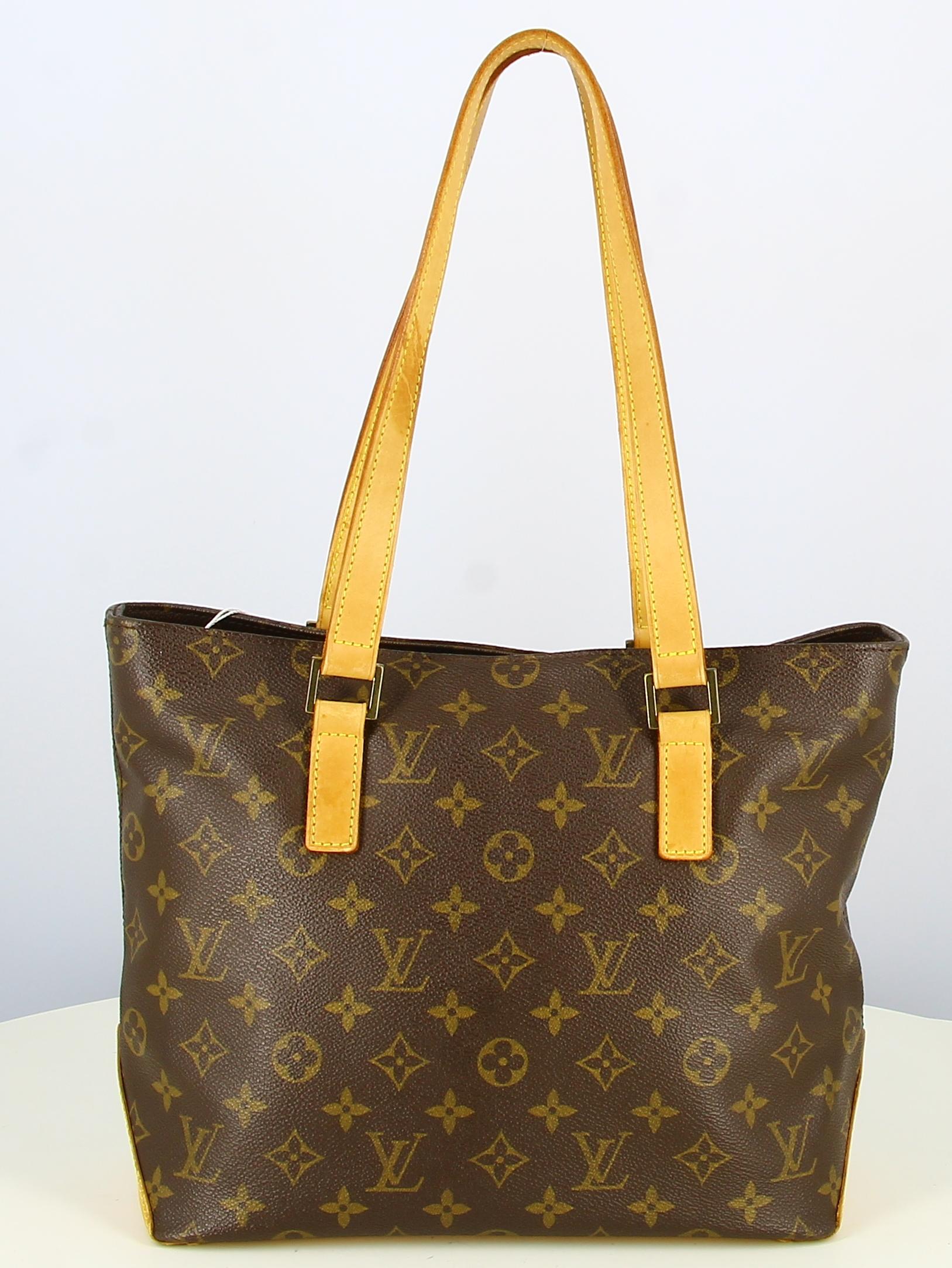 2002 Louis Vuitton Monogram Canvas Handbag 

- Very good condition. Shows very slight signs of wear over time.
- Louis Vuitton Handbag
- Canvas monogram
- Brown leather hanses
- Interior : Brown canvas. Small zipped pocket inside