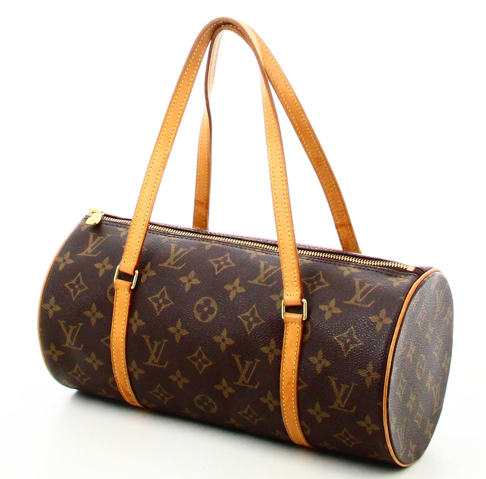 2002 Louis Vuitton Papillon Monogram Canvas Bag

- Very good condition. Shows very slight signs of wear over time. 
- Louis Vuitton Handbag 
- Monogram canvas 
- Two brown leather handles 
- Clasp: golden zipper 