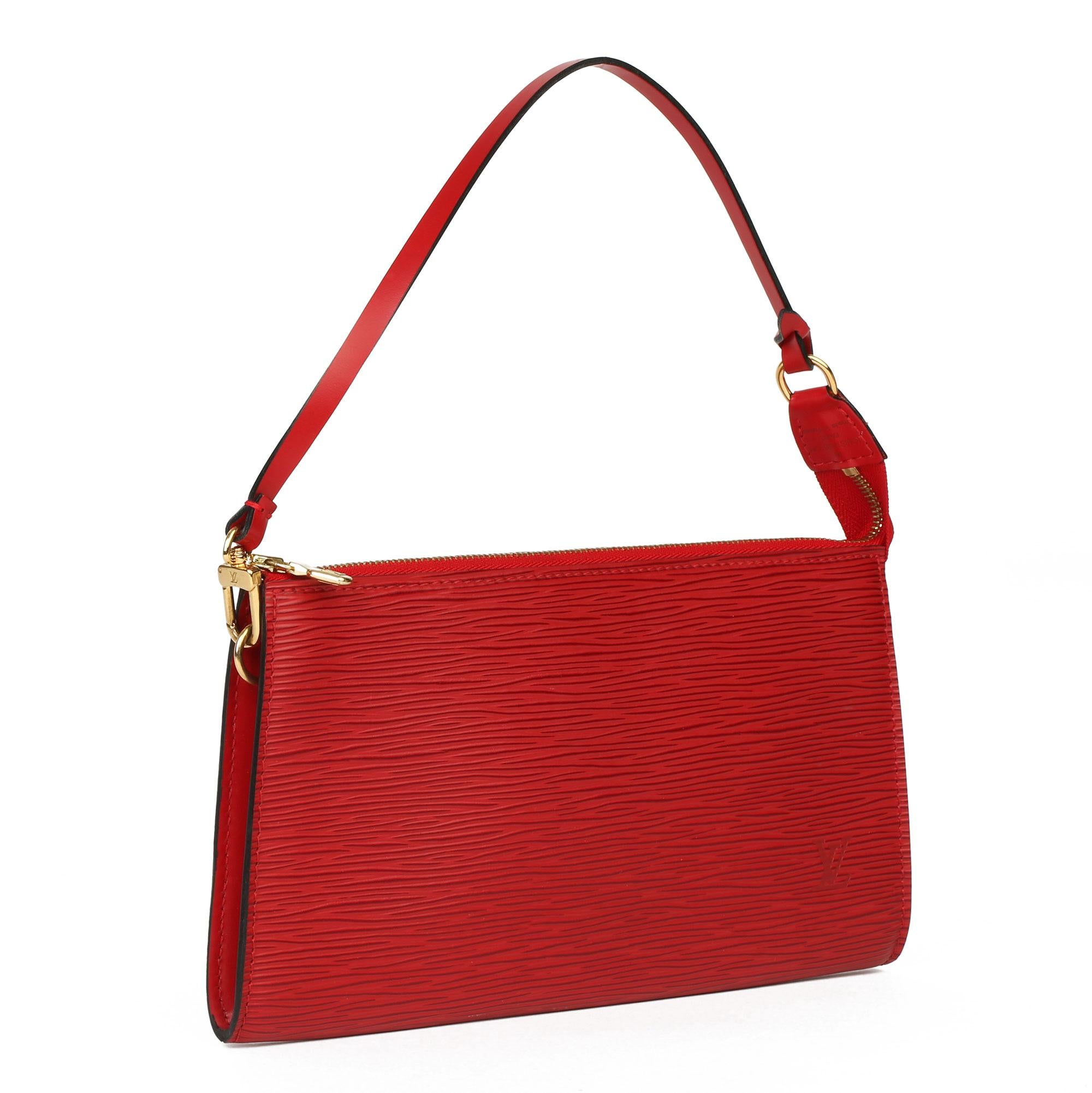 LOUIS VUITTON
Red Epi Leather Vintage Pochette Accessoires

Xupes Reference: CB305
Serial Number: AR0042
Age (Circa): 2002
Accompanied By: Louis Vuitton Dust Bag
Authenticity Details: Date Stamp (Made in France) 
Gender: Ladies
Type: Top Handle,