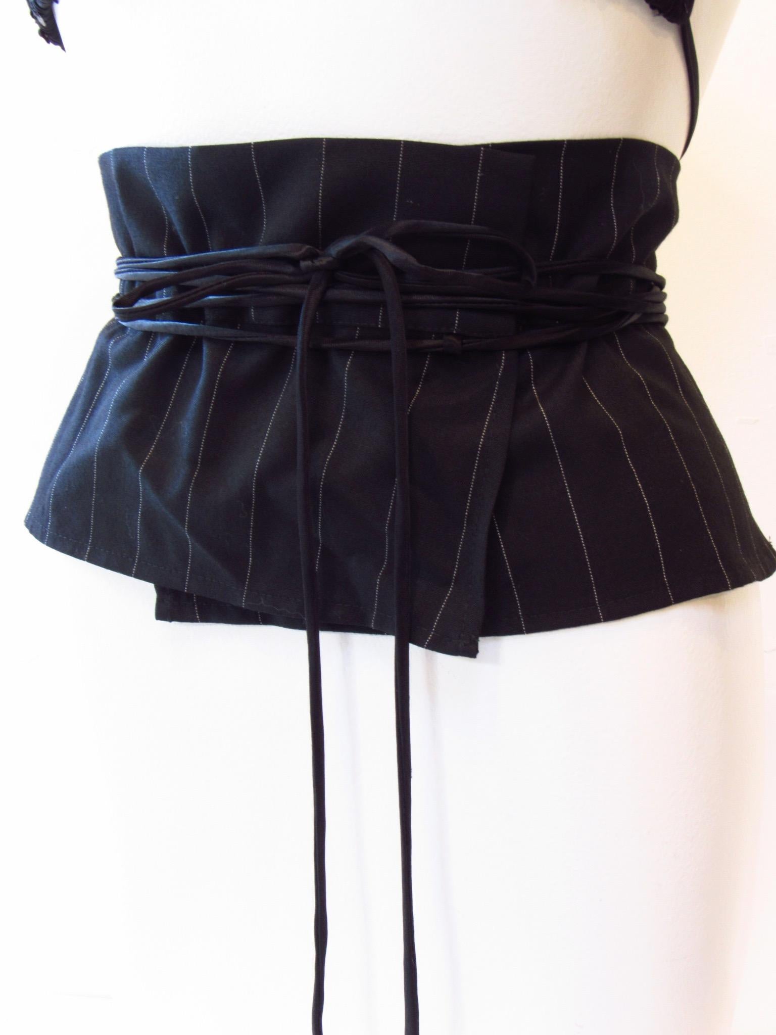 Maison Martin Margiela 2002 Collection black and white pinstriped wide waist belt with a back bustle and long satin self-tying string closures. New in Box with Tag.