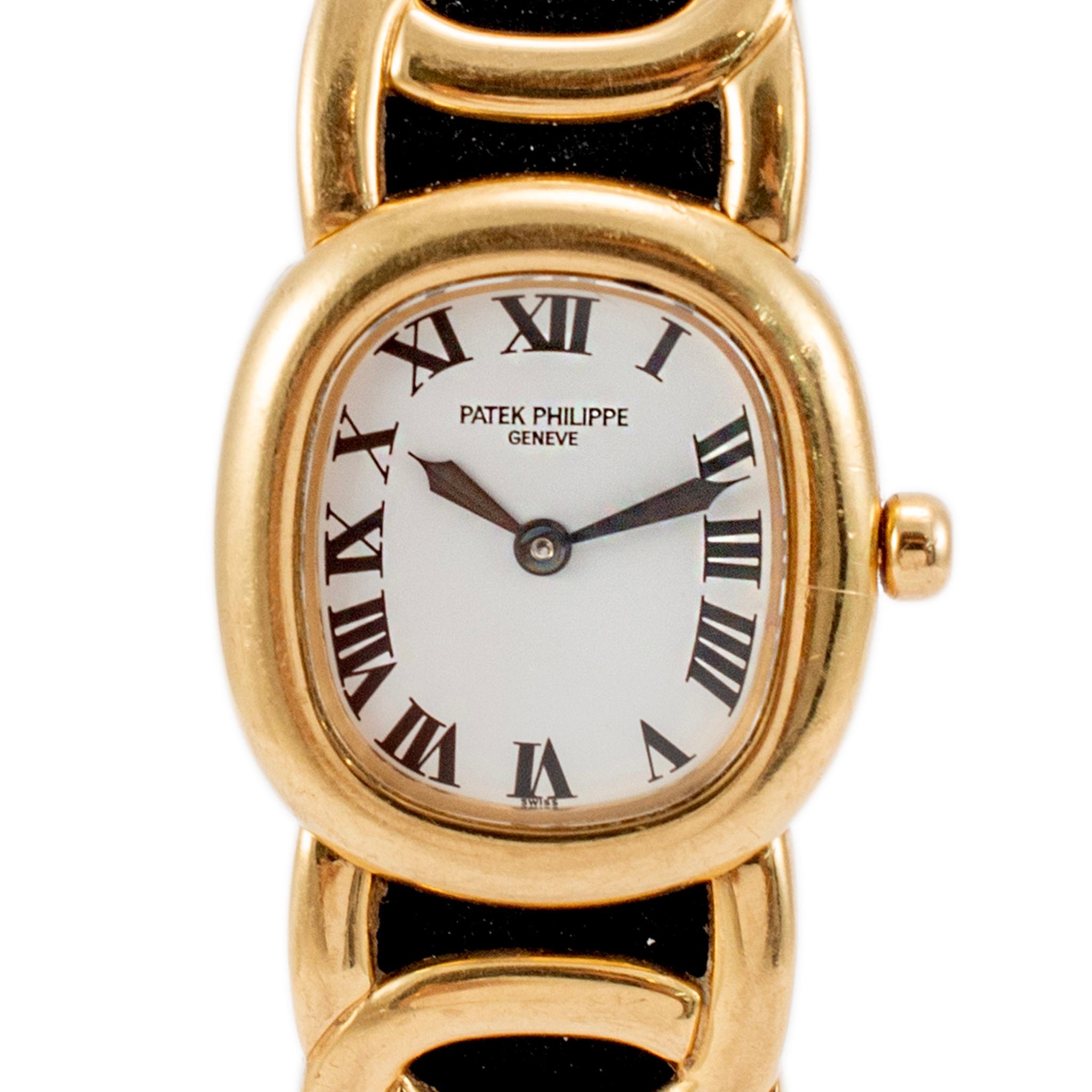Brand: Patek Philippe

Gender: Ladies

Metal Type: 18K Yellow Gold

Diameter: 23.00 mm

Weight: 42.53 grams

One ladies 18K yellow gold PATEK PHILIPPE Swiss-made watch with original box and papers. The metal was tested and determined to be 18K